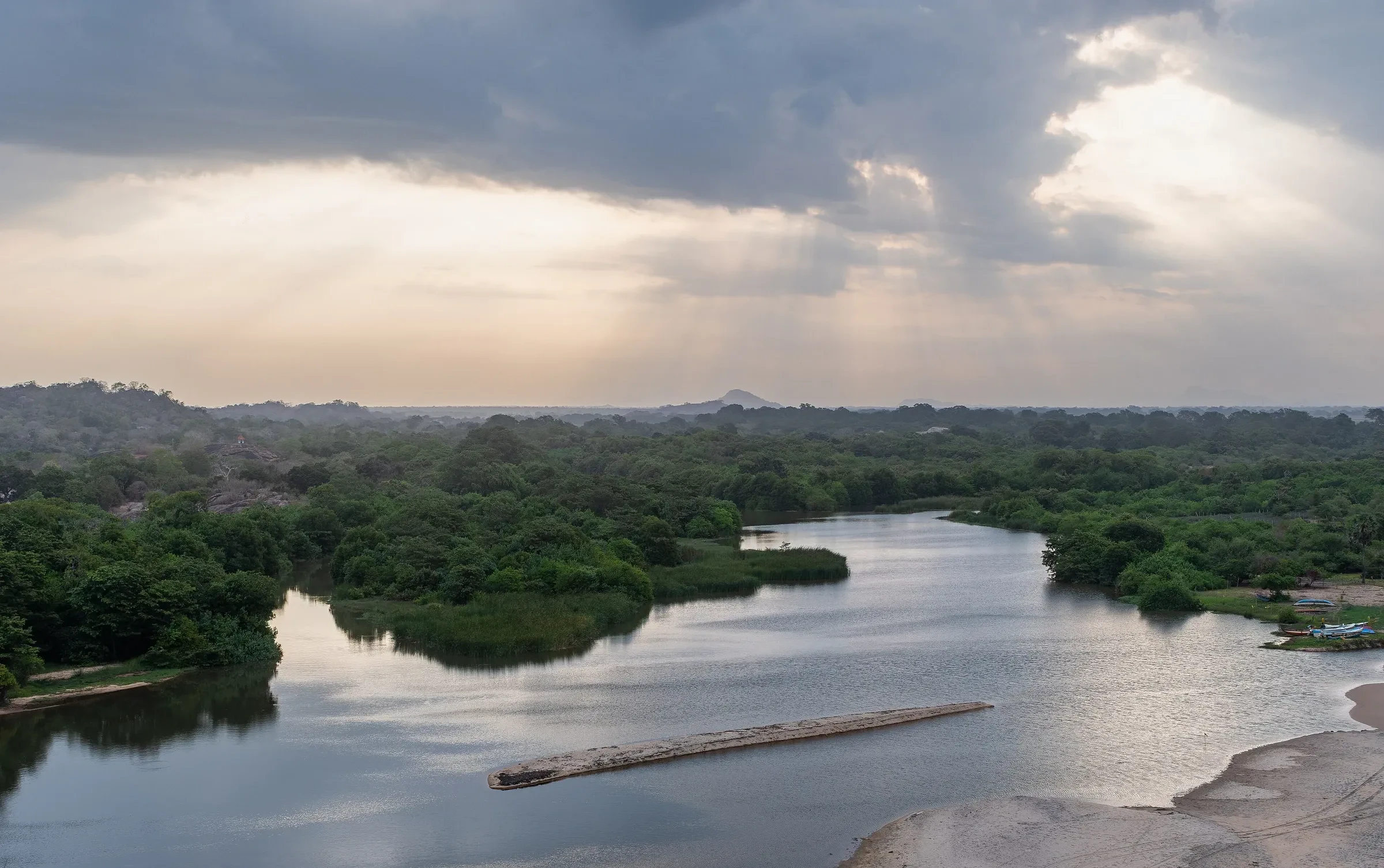 Evening view inland from Elephant Rock over the Heda Oya river near Arugam Bay