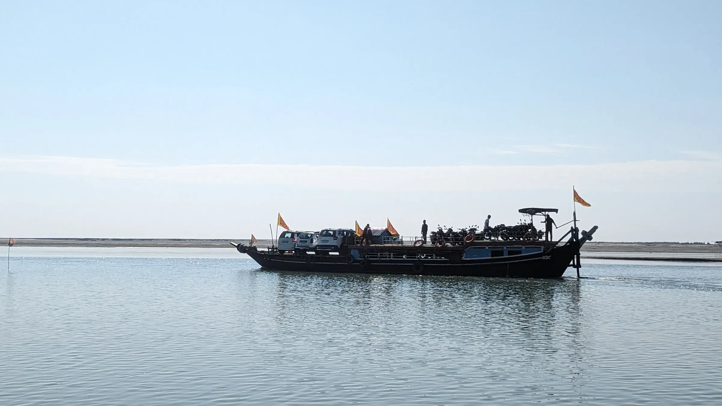 A passenger boat crossing the Brahmaputra river at Majuli