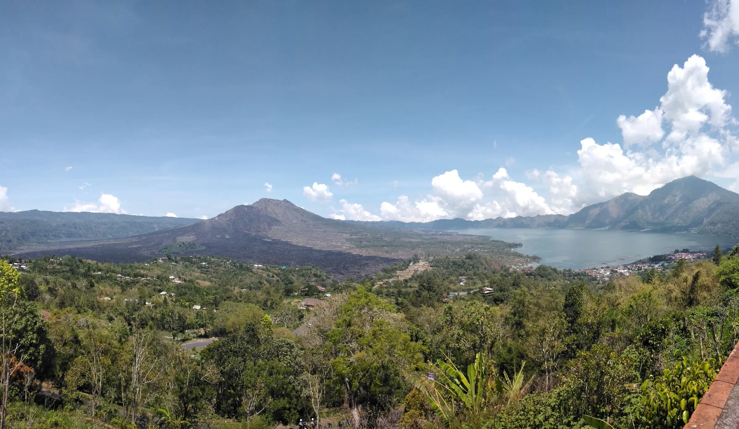 Mount Batur and its crater lake seen from the Kintamani rim in Bali