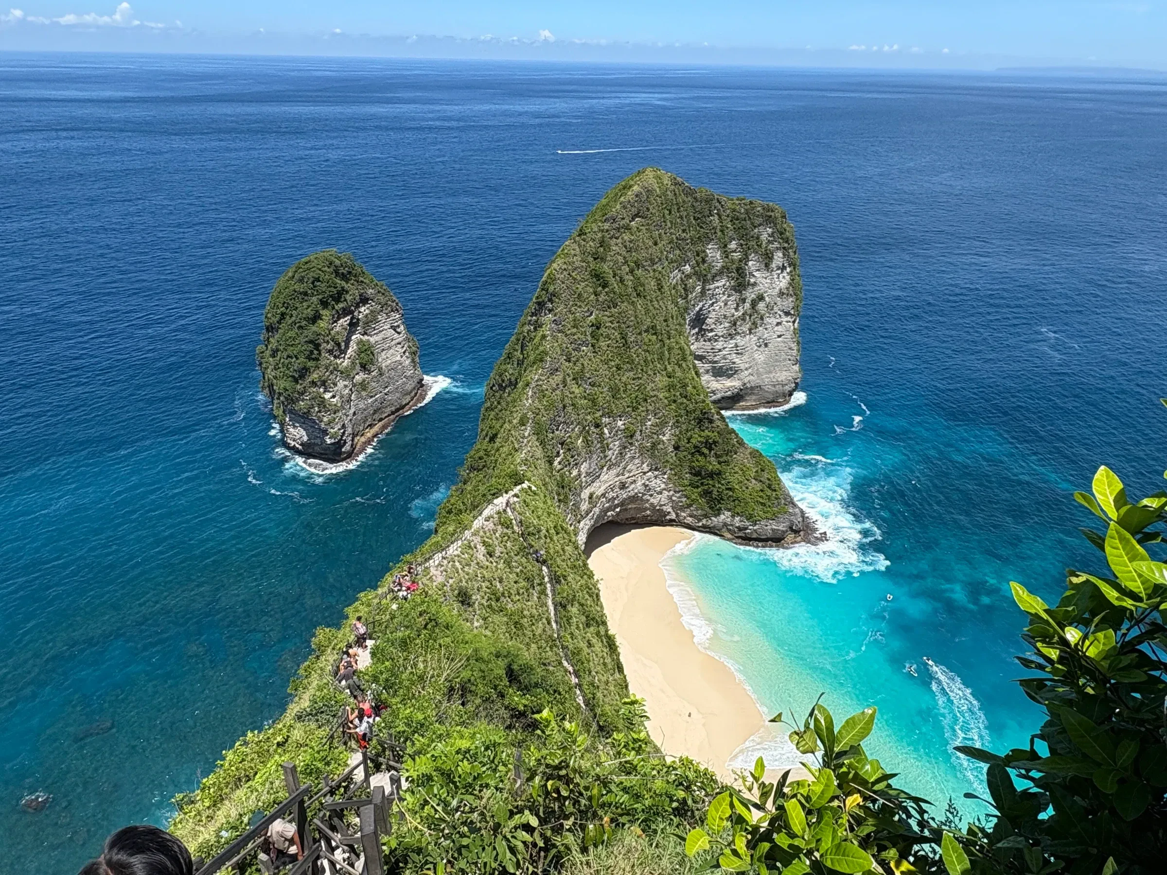 The T-rex-shaped headland at Kelingking Beach on Nusa Penida, above turquoise water