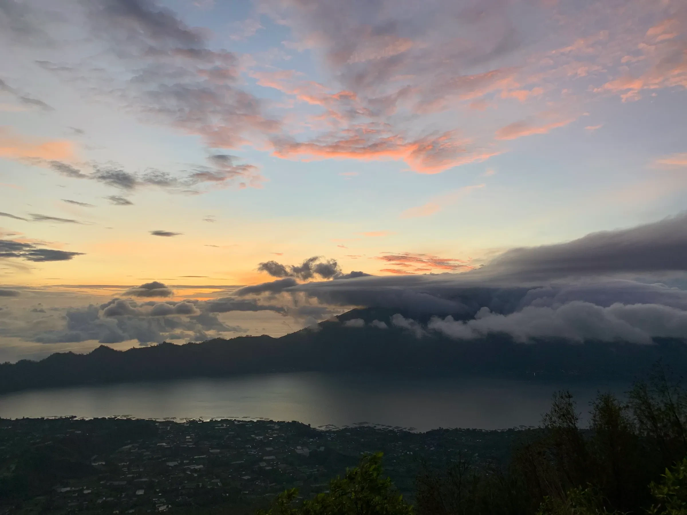 Sunrise over Lake Batur and the caldera in the Kintamani highlands