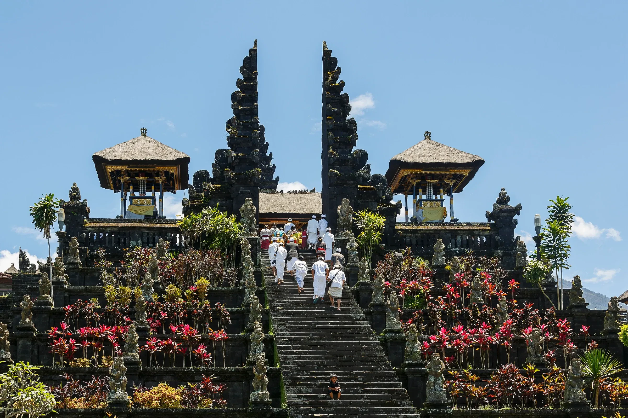 Worshippers in white on the steps of Pura Besakih, the Mother Temple of Bali