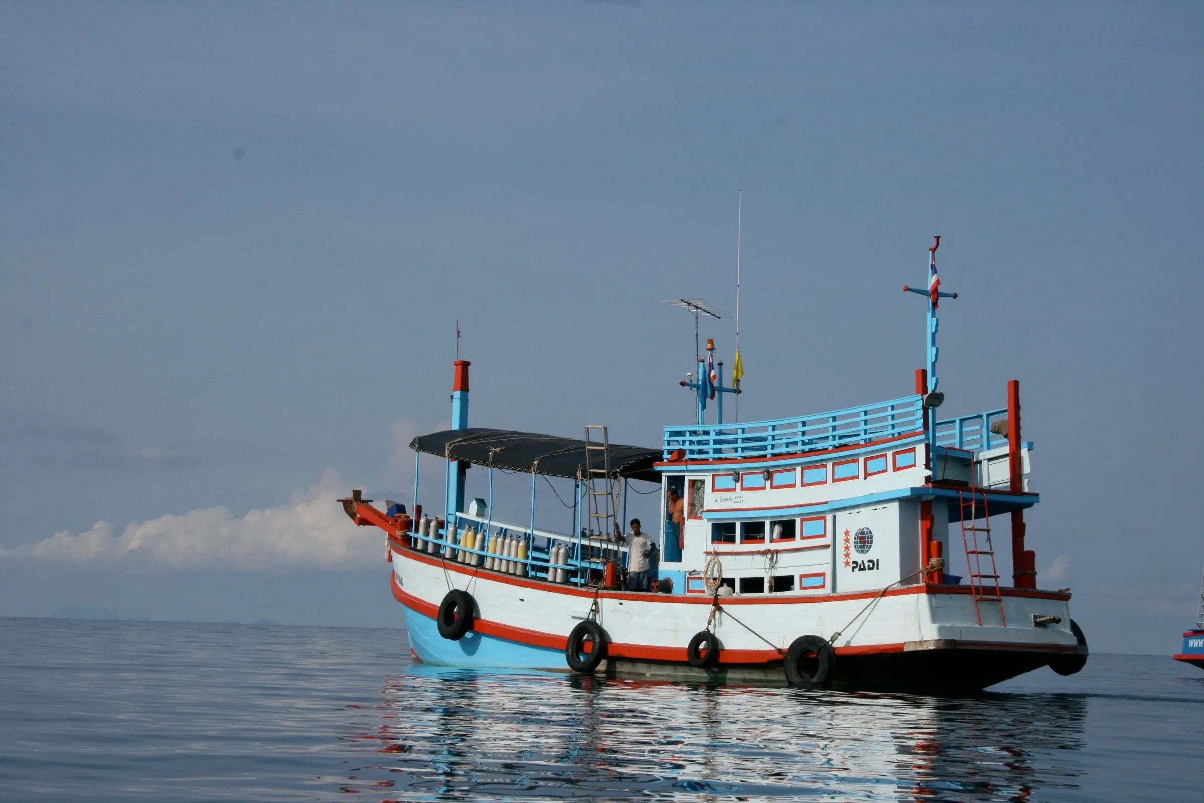 A dive boat at sea off Koh Tao, Thailand