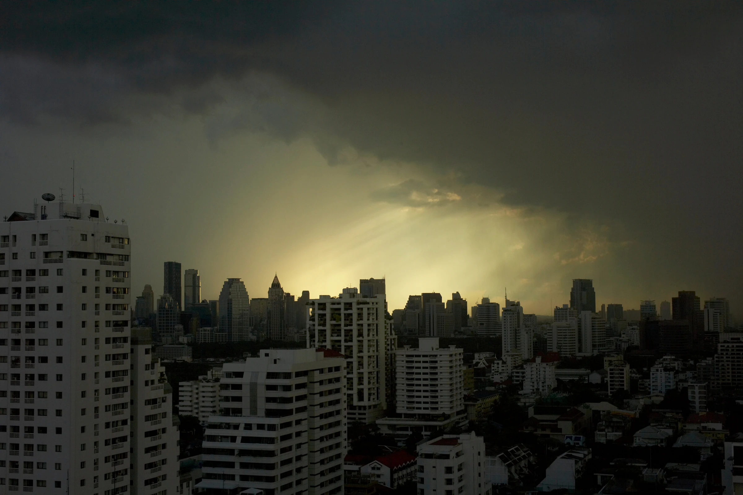 Storm clouds building over the Bangkok skyline