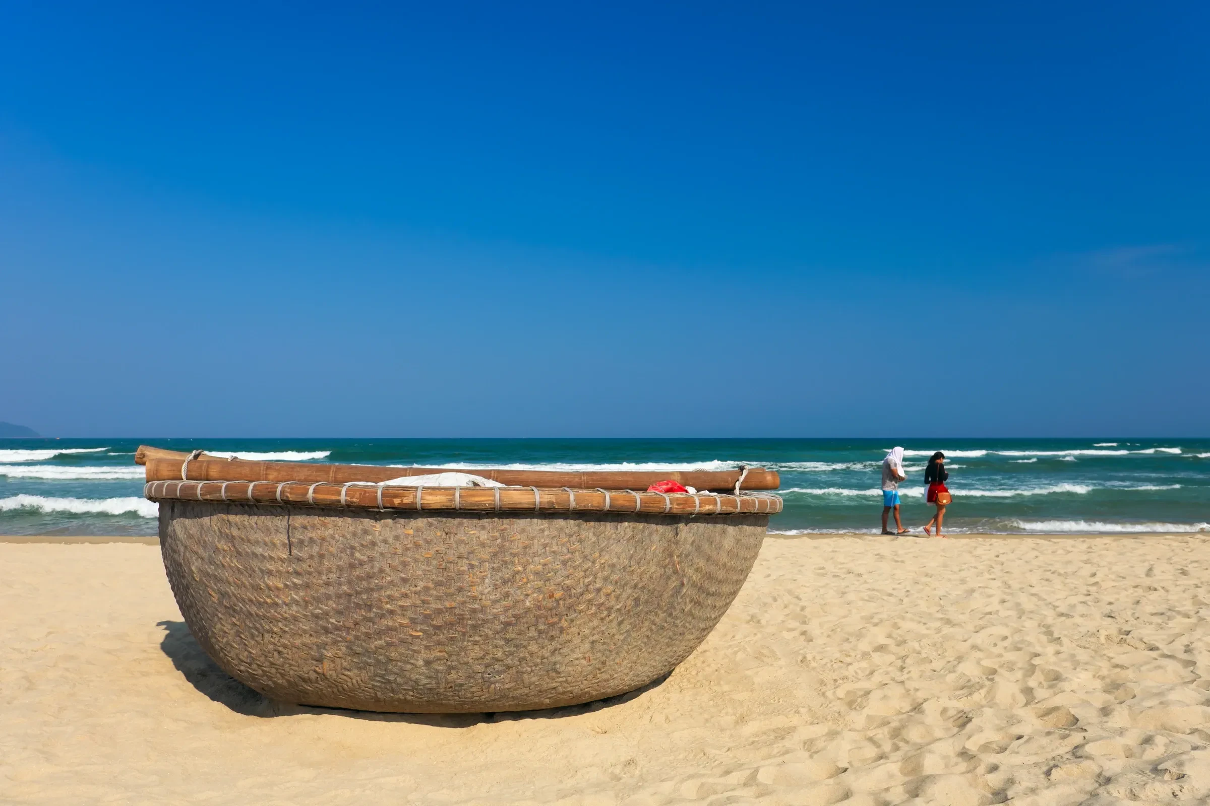 Round basket boats on a beach in Da Nang