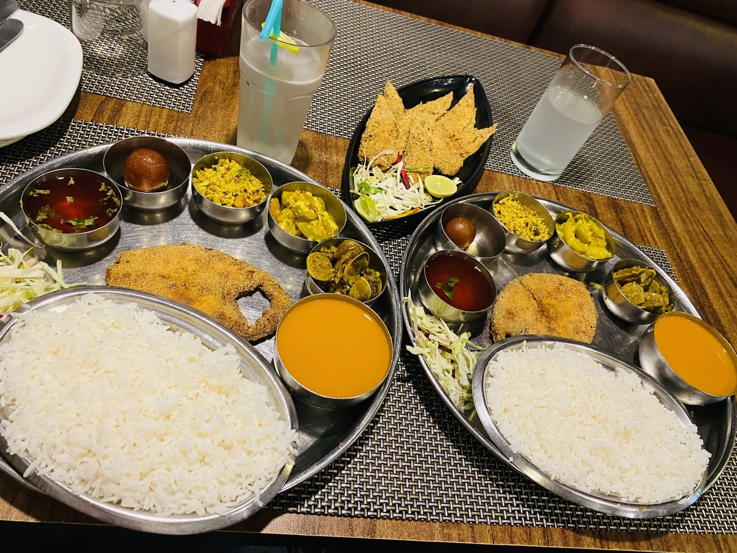 A Goan fish thali with rice, fish curry, fried kingfish and sol kadhi