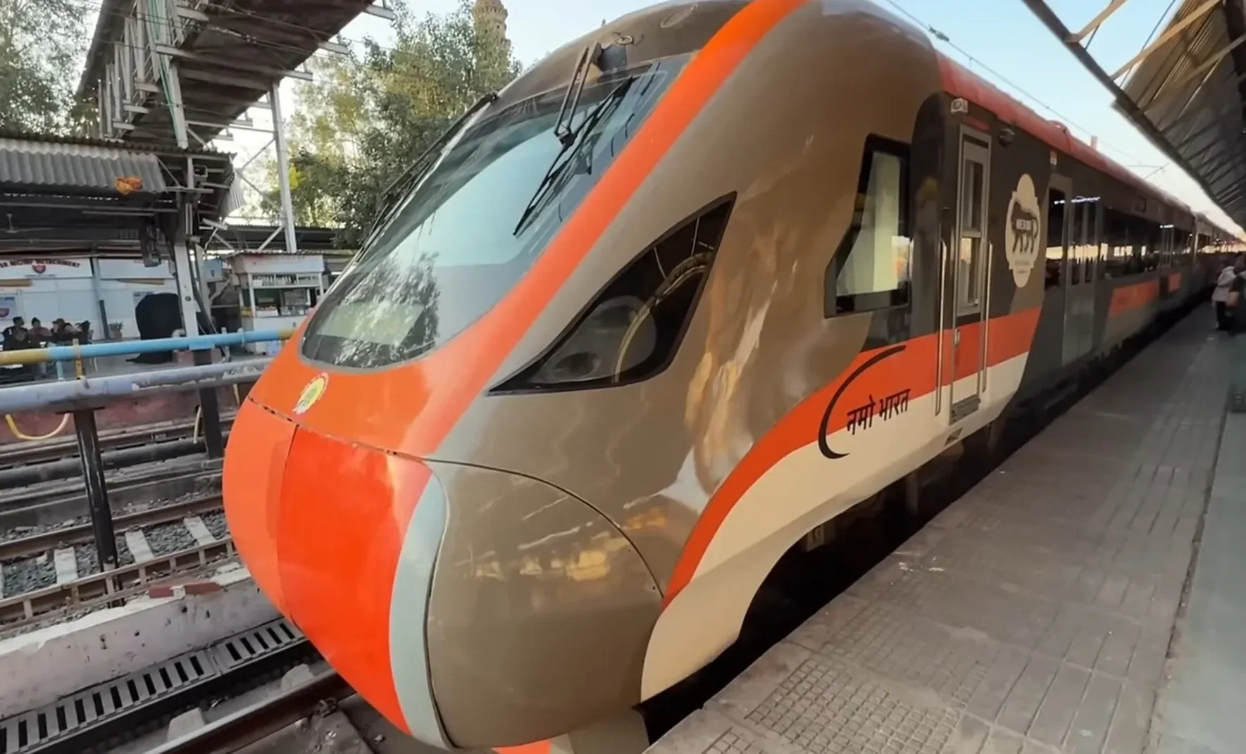 A Namo Bharat Rapid Rail train standing at a platform, the Ahmedabad to Bhuj service