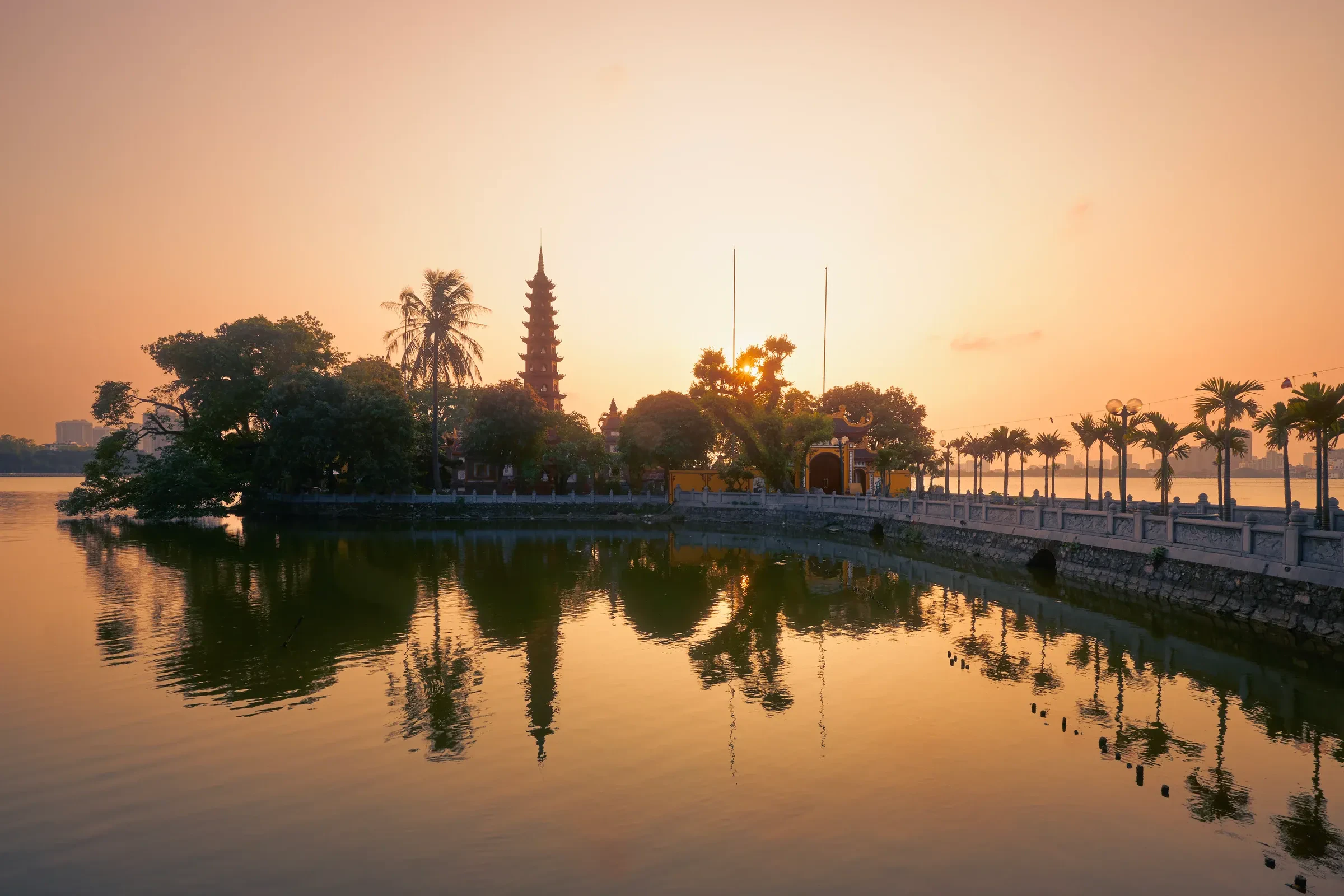 West Lake in Hanoi with a temple reflected in the water