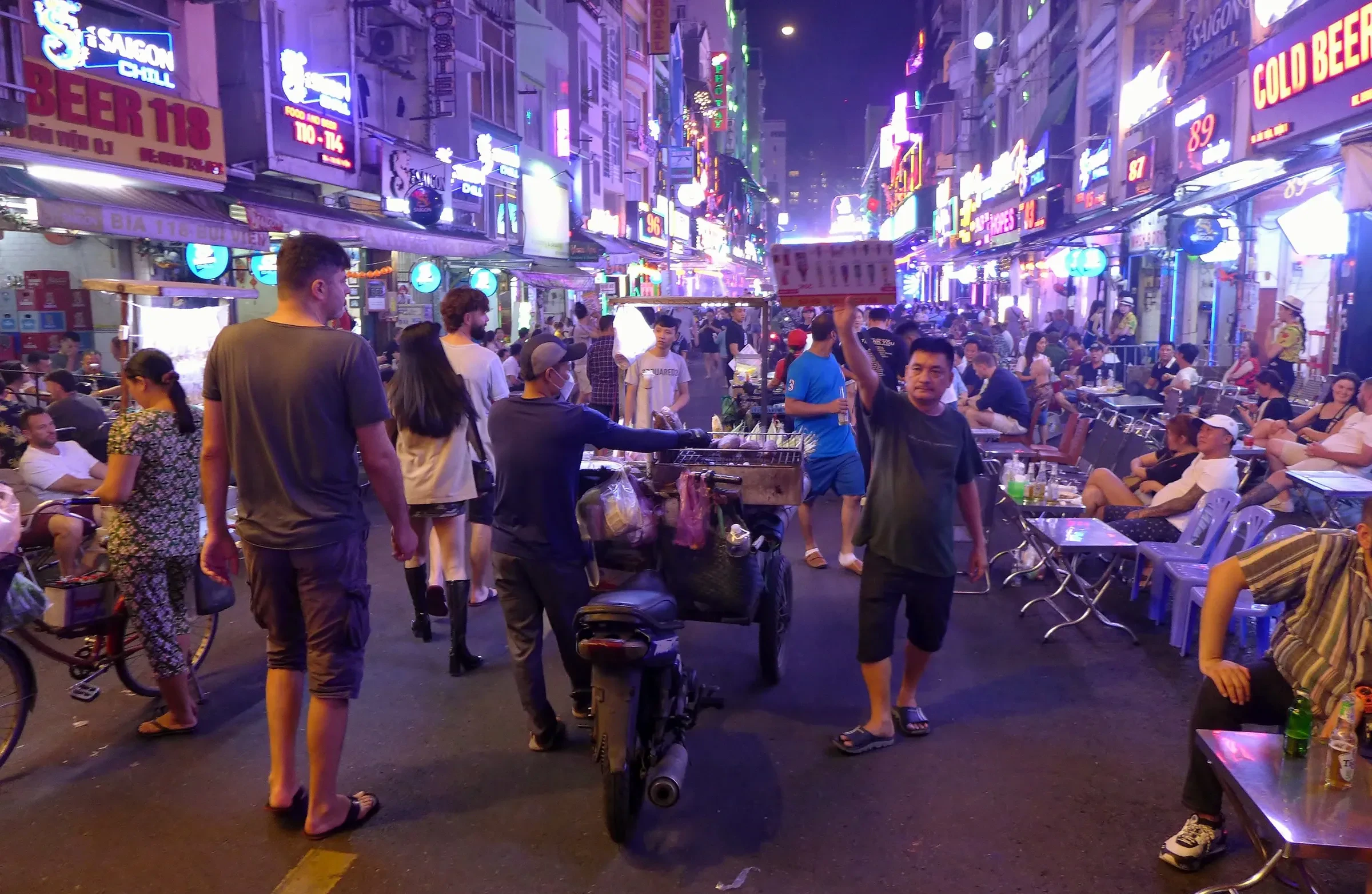 Bui Vien walking street in Ho Chi Minh City lit up at night