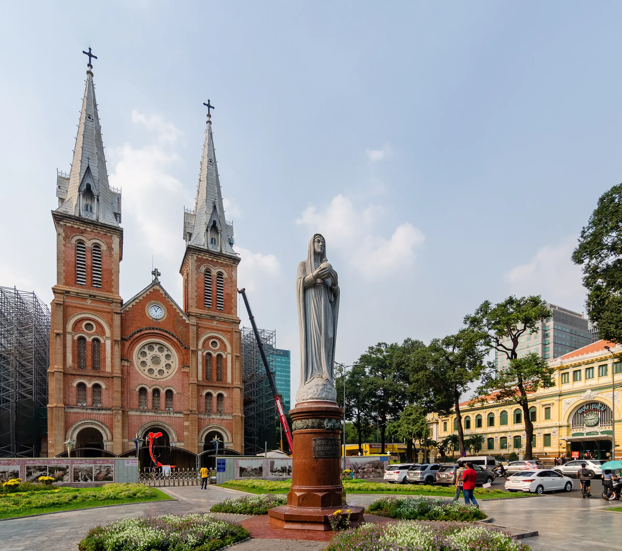 Notre-Dame Basilica's twin towers beside the Central Post Office in Ho Chi Minh City