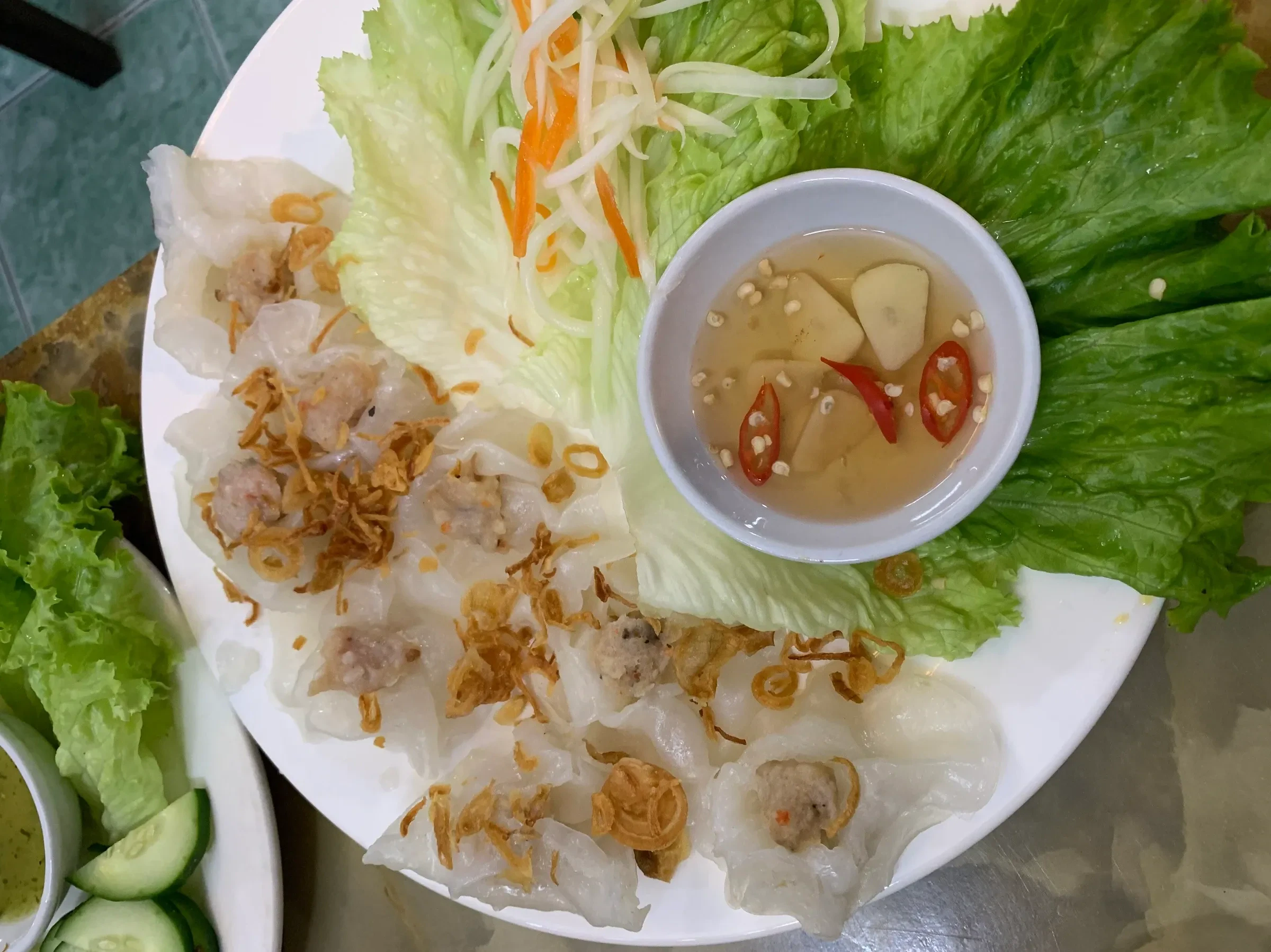 White rose dumplings with fried shallots and dipping sauce in Hoi An