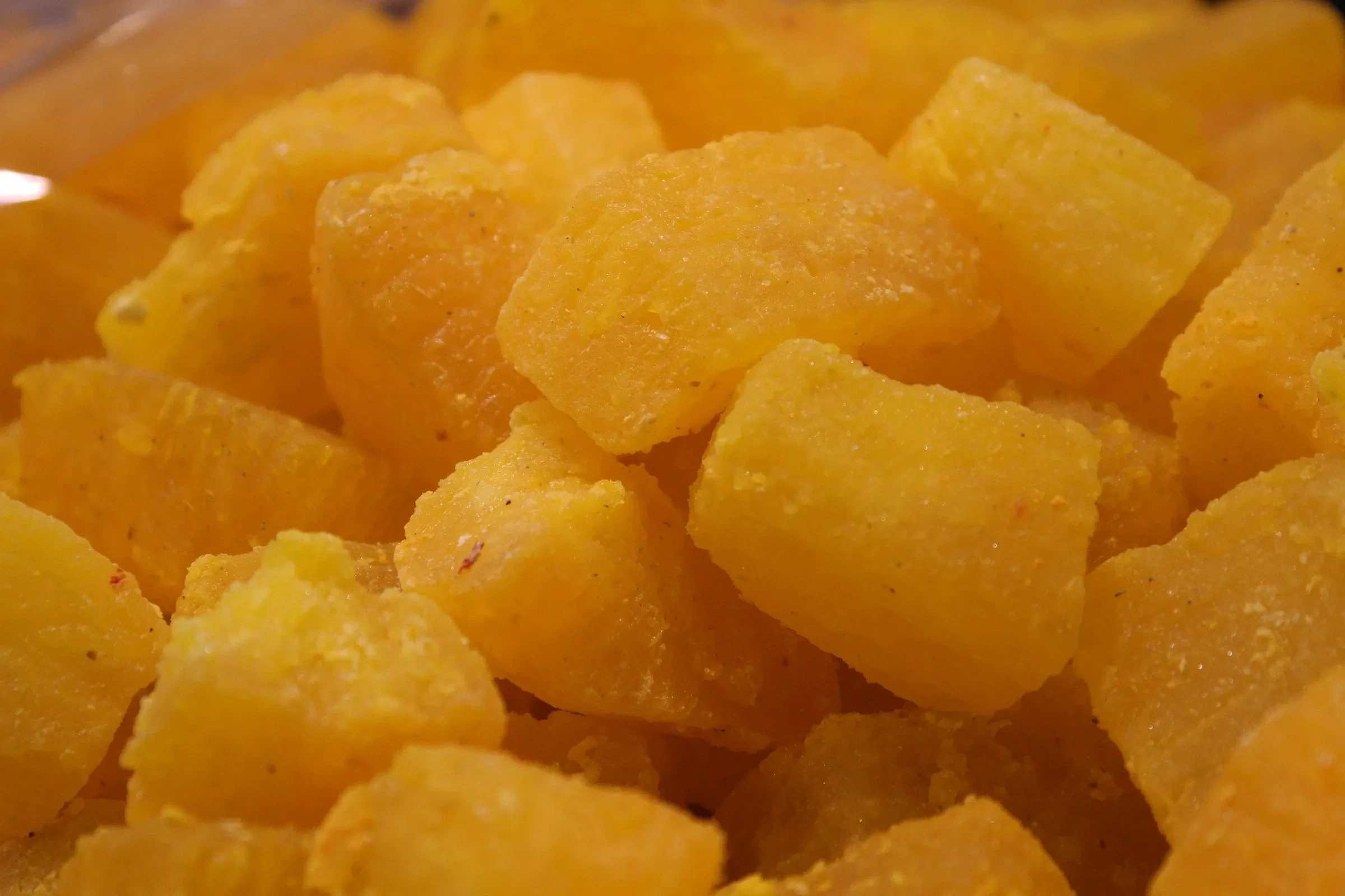 Orange cubes of kesari petha, a flavoured version of the ash-gourd sweet