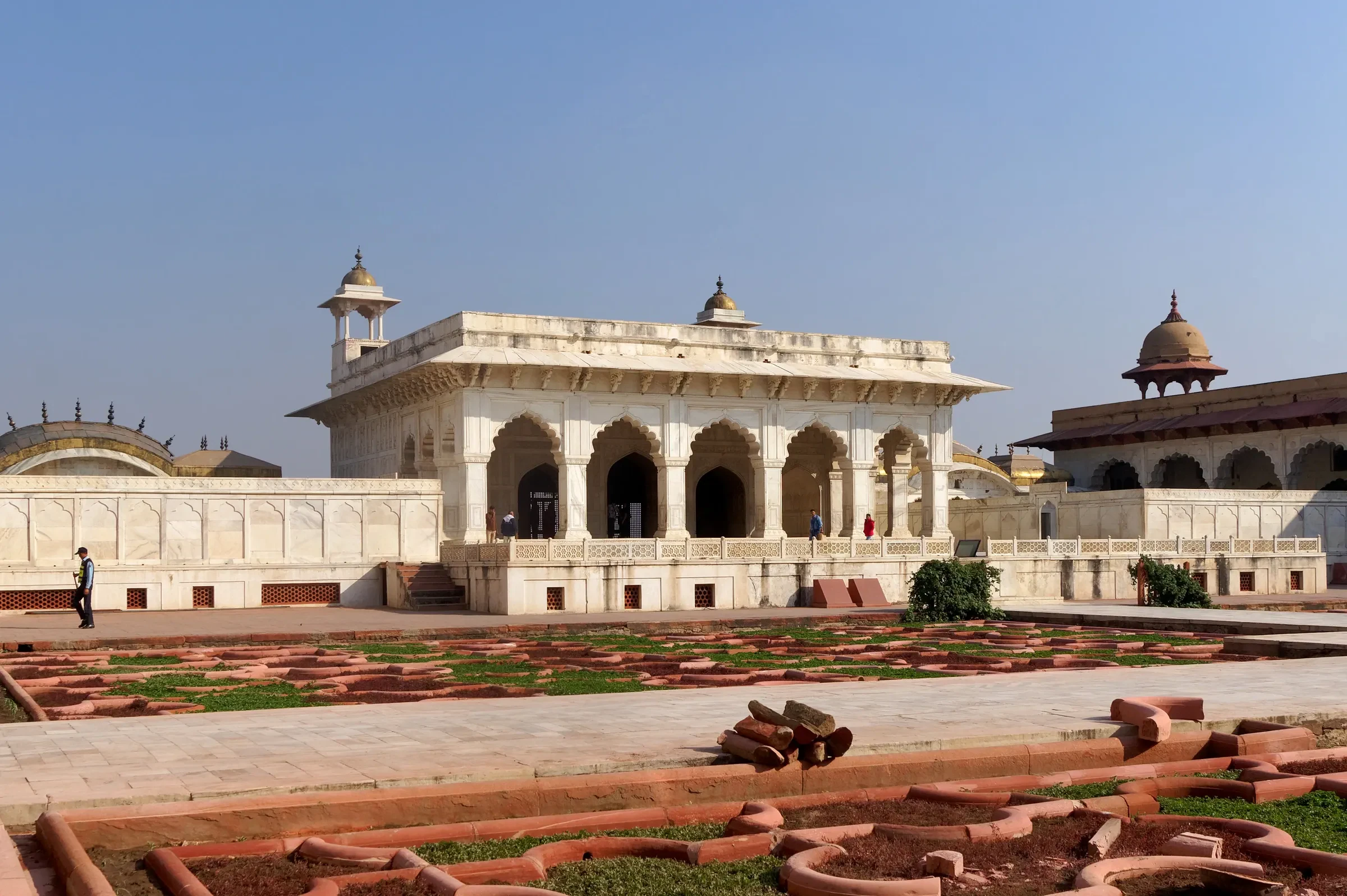 A white marble pavilion in Agra Fort, looking over a formal garden court