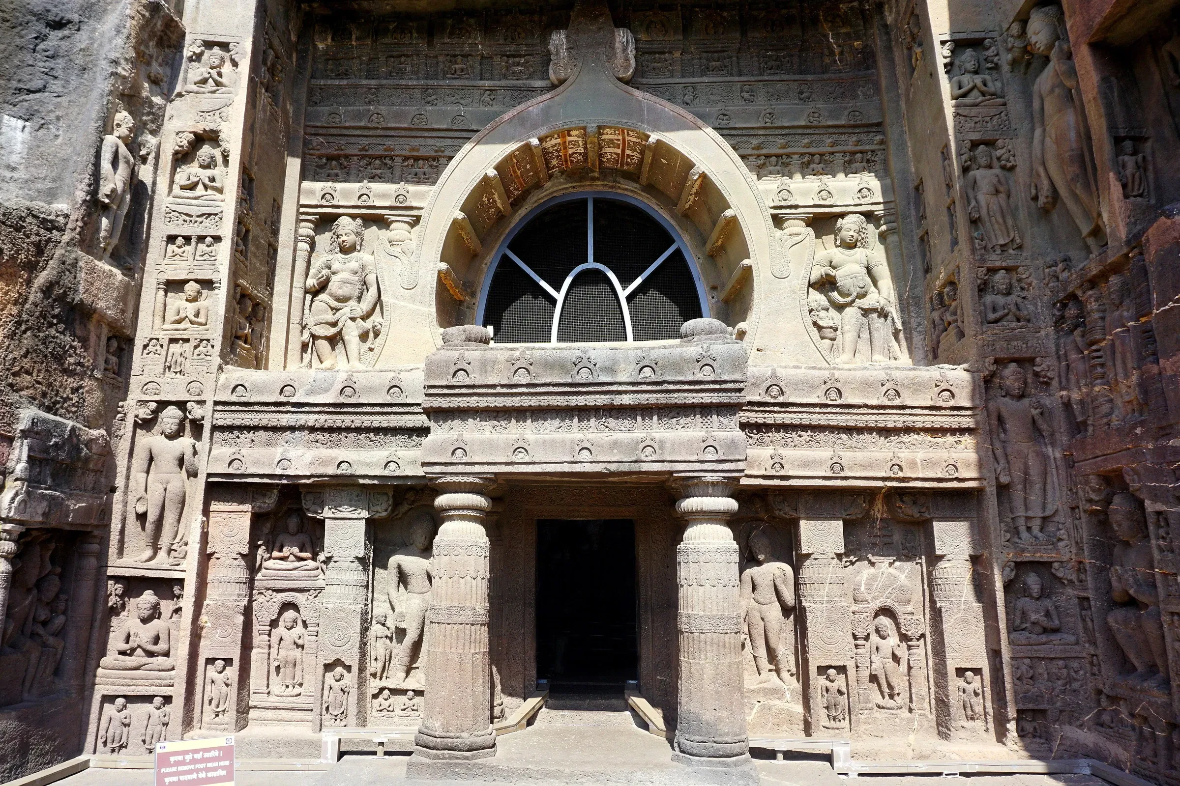 The carved facade of Cave 19 at Ajanta, with its horseshoe-shaped window