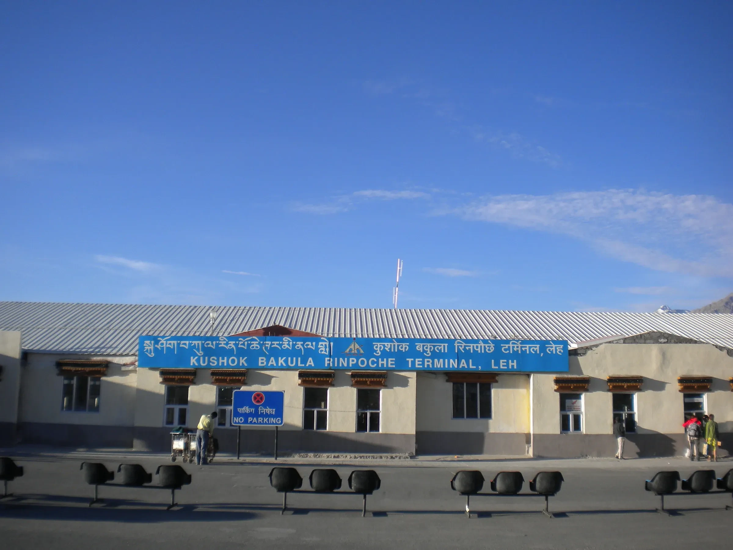 The terminal building of Leh airport in Ladakh, with signs in Tibetan and Hindi