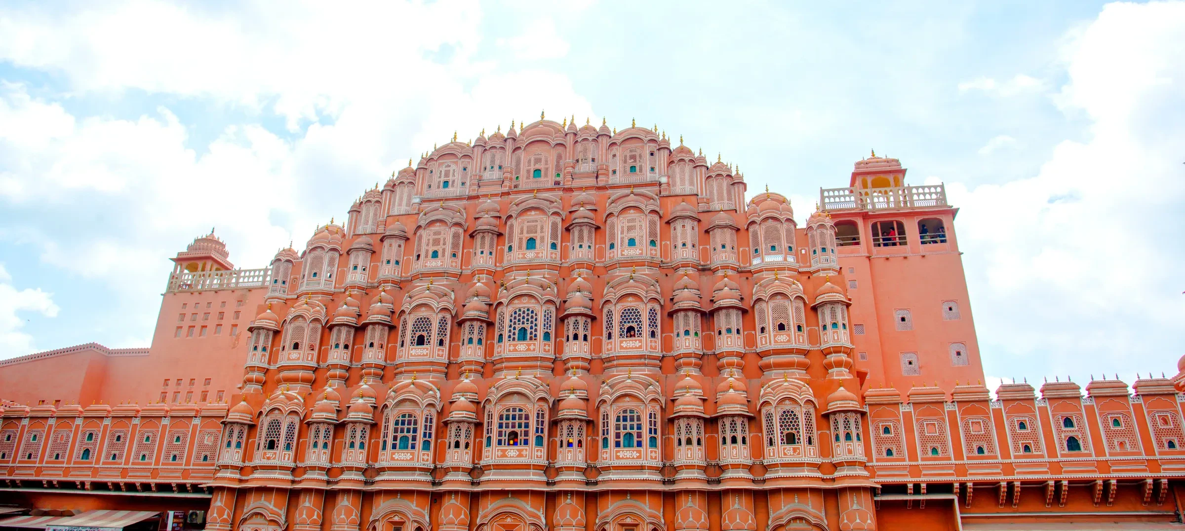 The pink sandstone front of the Hawa Mahal in Jaipur, a usual first stop on a North India route