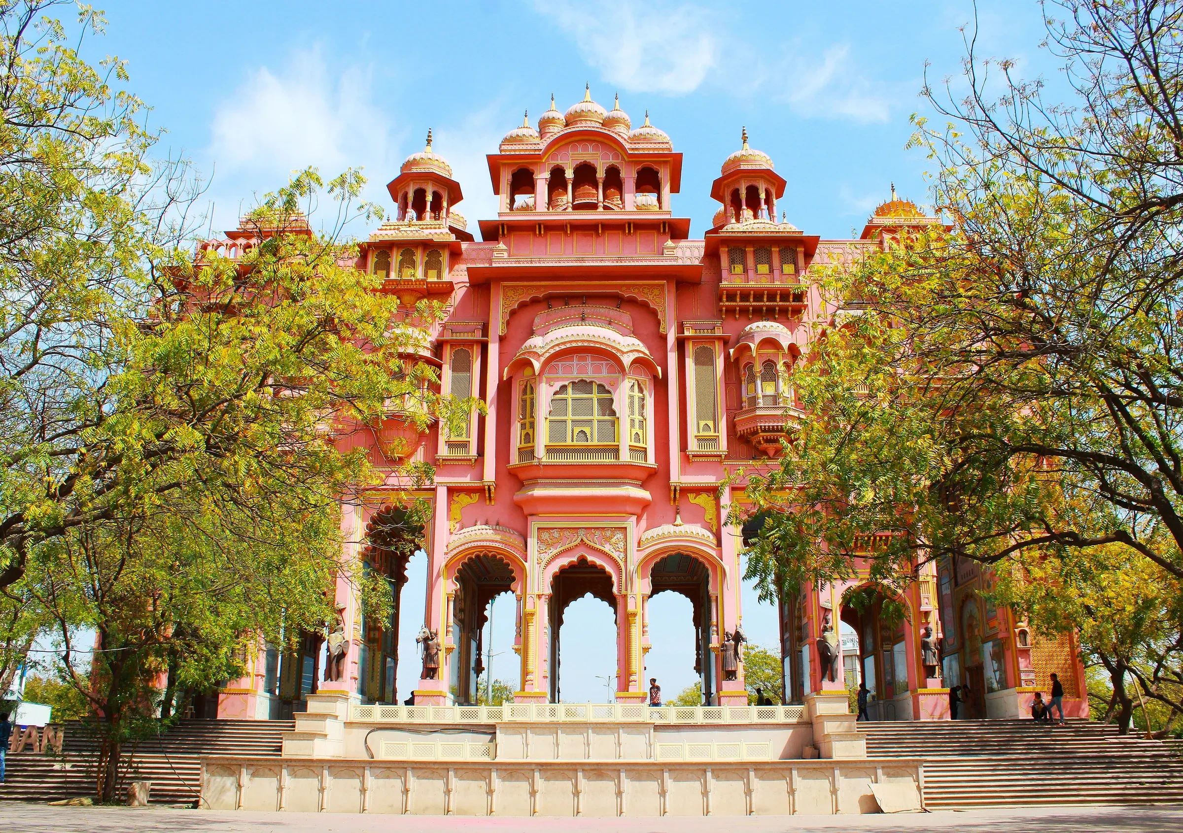 Patrika Gate at Jawahar Circle in Jaipur, a painted pink and red arched gateway