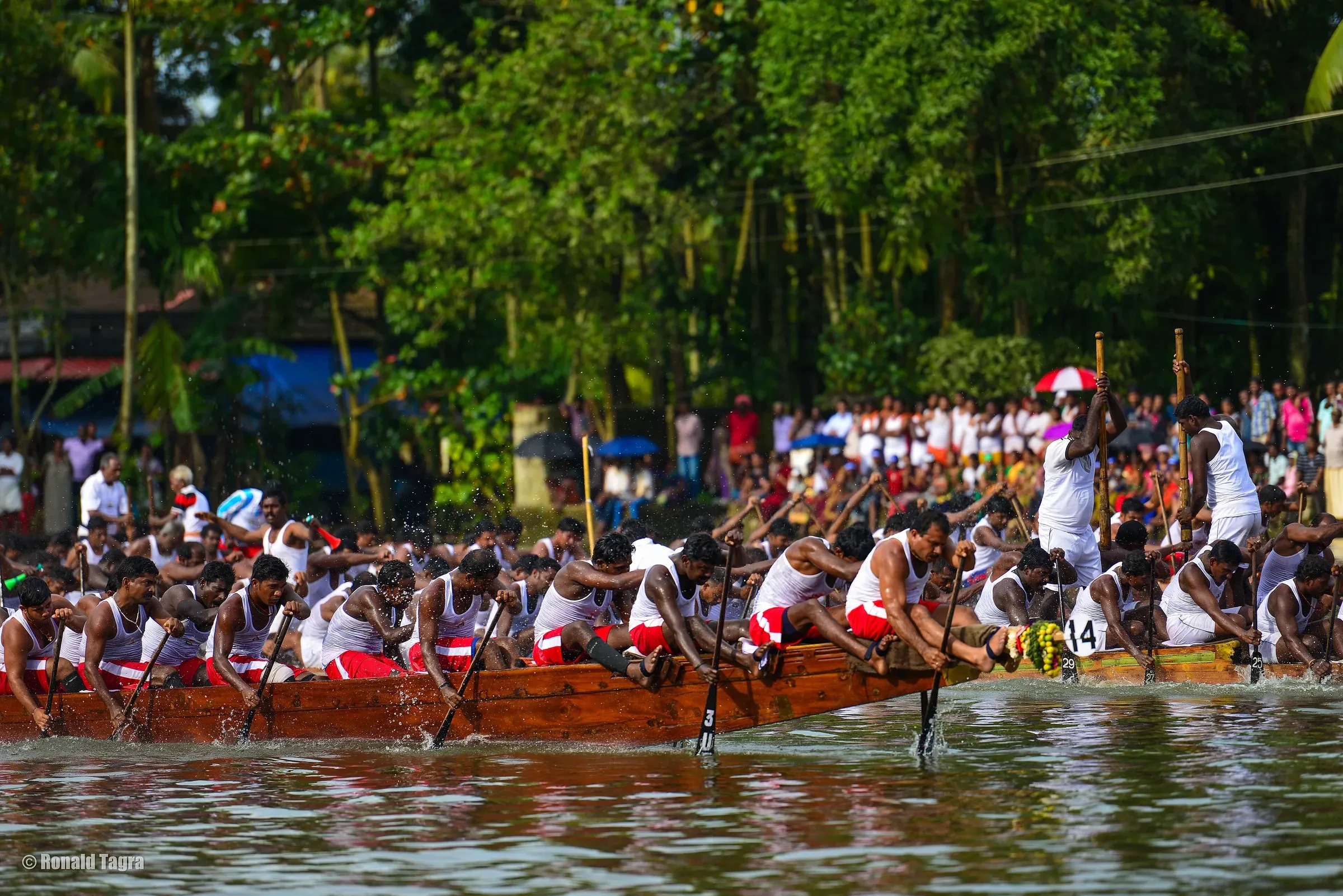A snake boat full of rowers during the Nehru Trophy Boat Race in Alappuzha