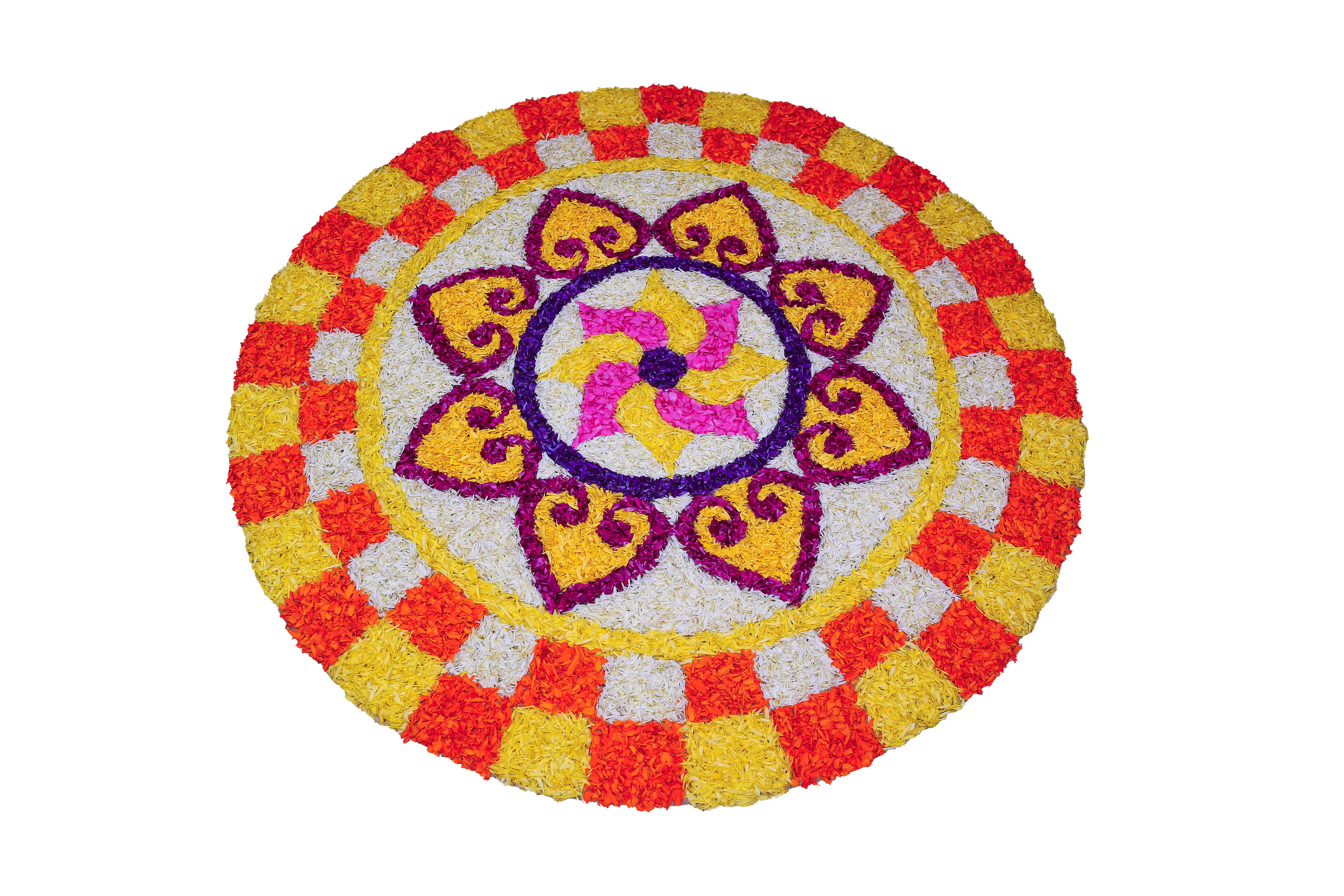 A flower carpet (pookalam) laid out in a courtyard during Kerala's Onam festival