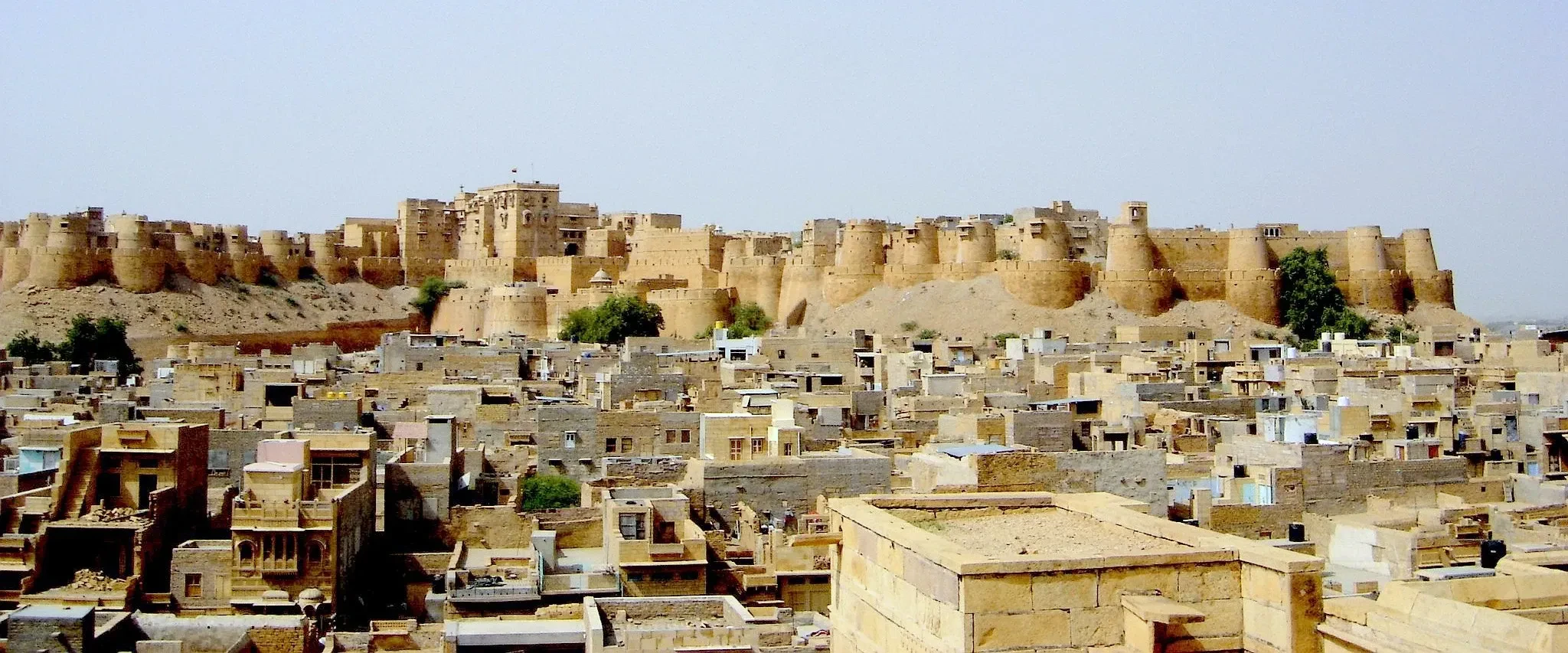 Jaisalmer Fort's sandstone walls above the town's flat-roofed houses