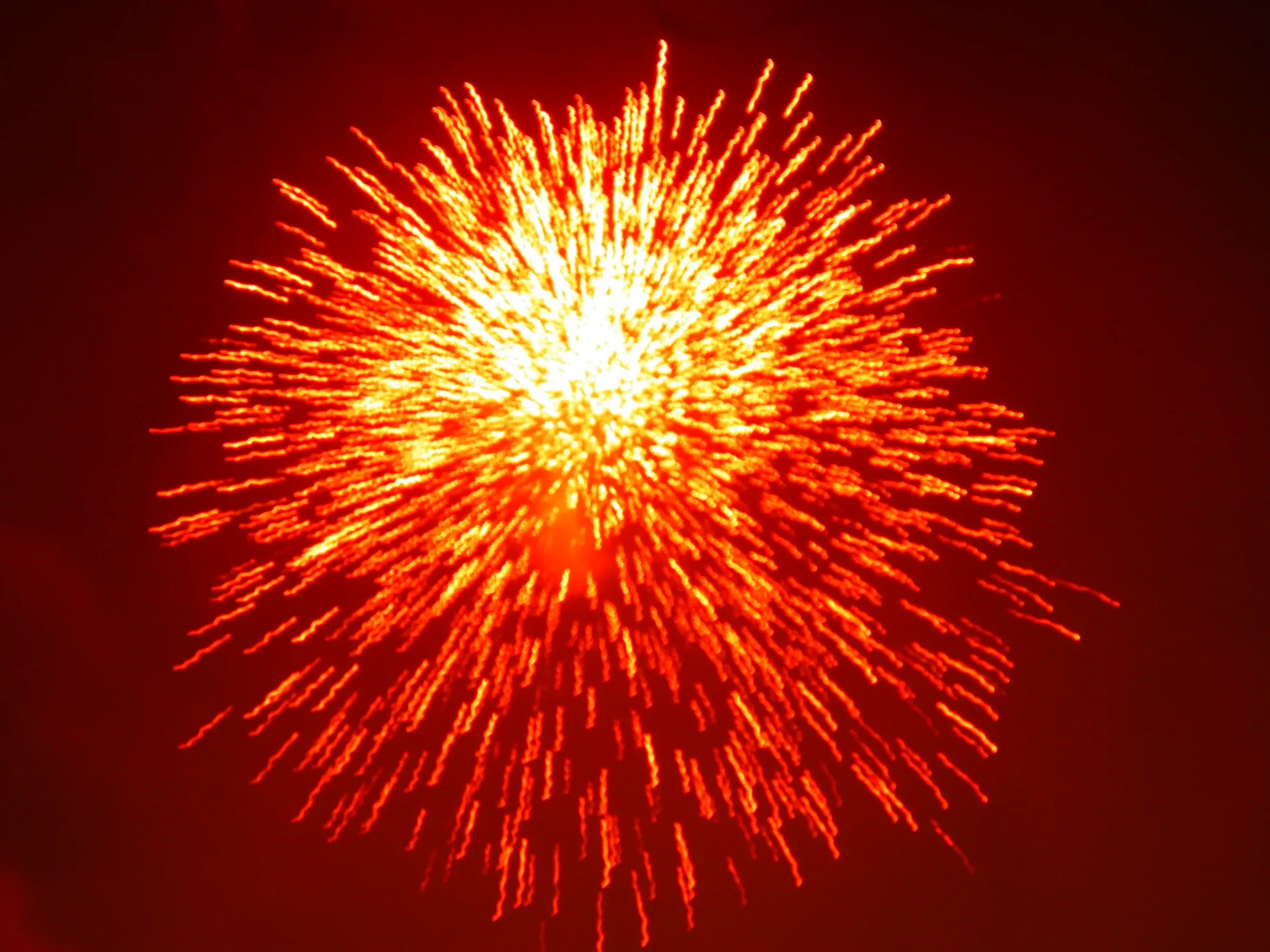 Fireworks bursting in the night sky during a past Thrissur Pooram