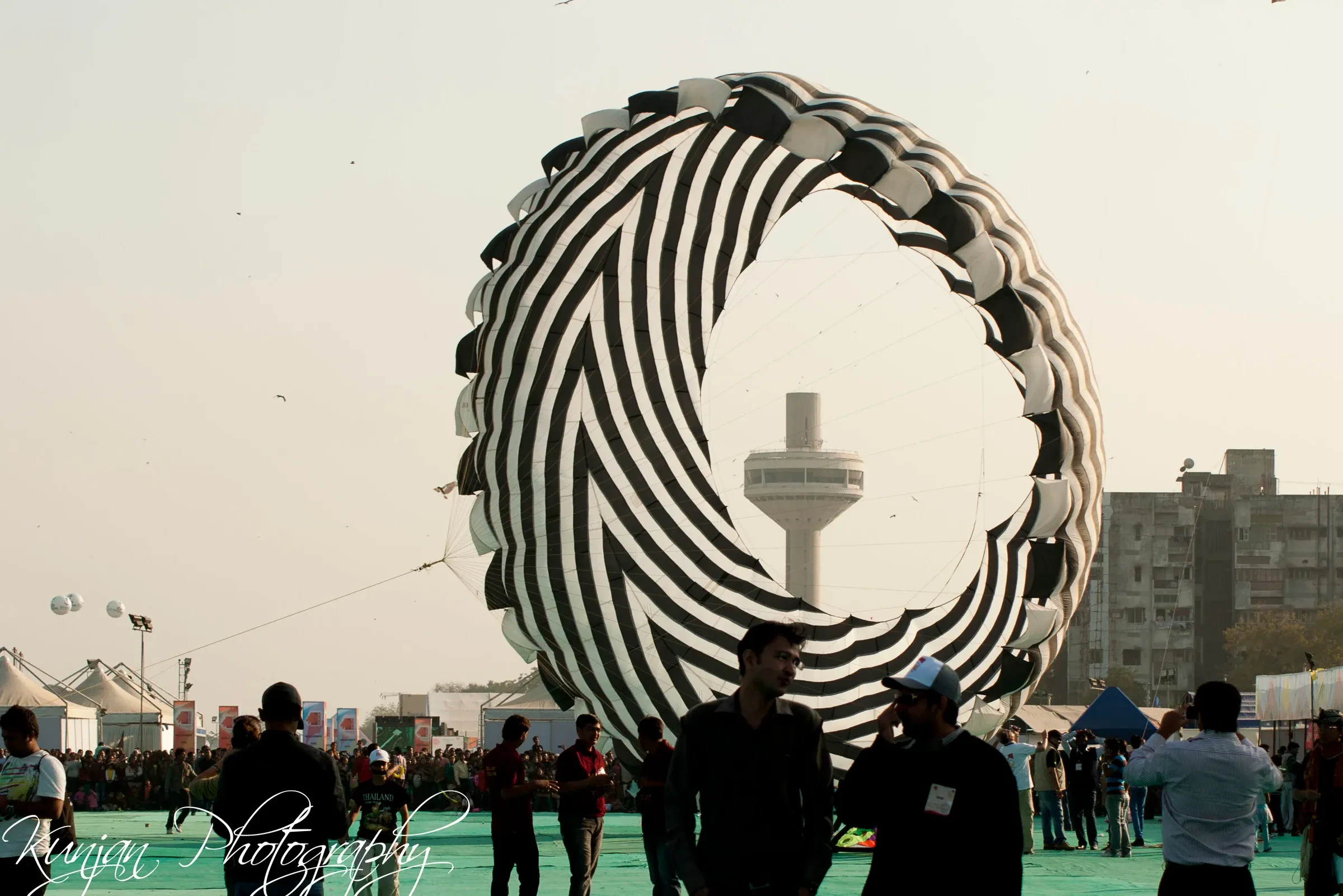 A giant ring-shaped show kite on display at the International Kite Festival on the Sabarmati Riverfront in Ahmedabad