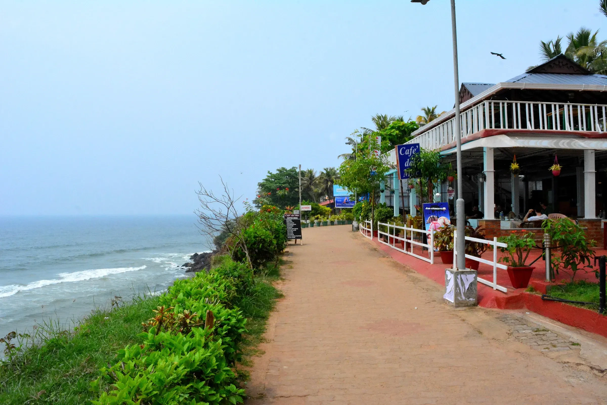 Cafes and a walking path along Varkala's North Cliff above the sea