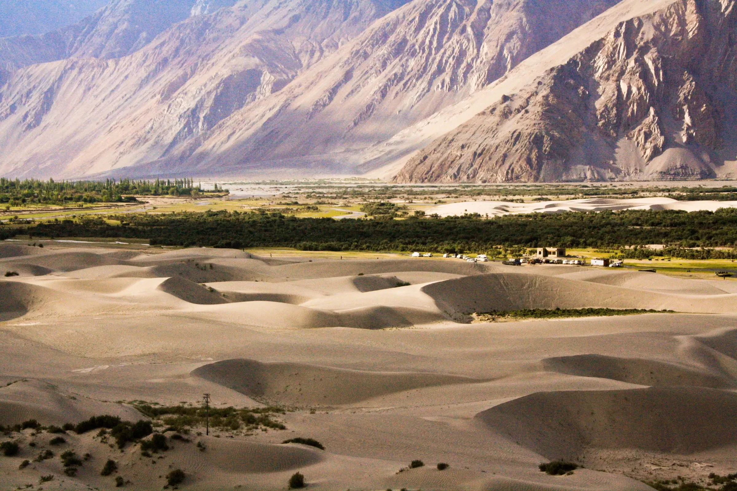 White sand dunes in Hunder, Nubra Valley, Ladakh, with mountains behind