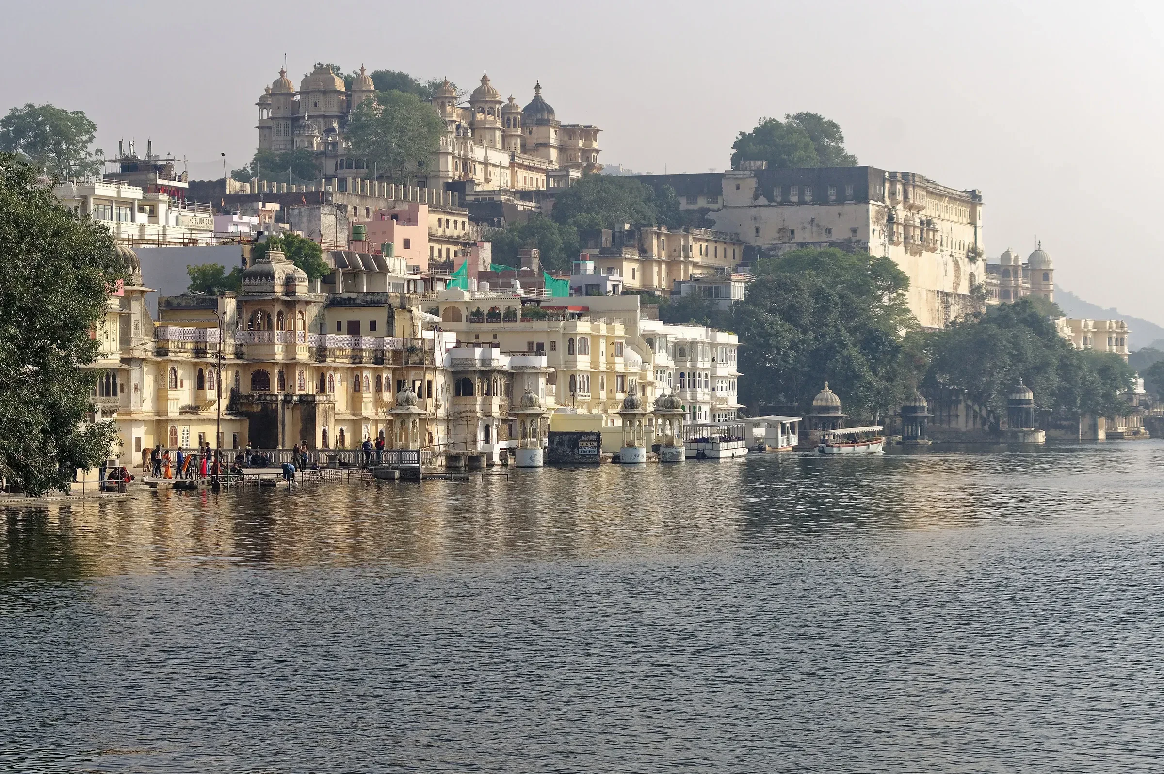 The ghats and old palace buildings on the shore of Lake Pichola in Udaipur, Rajasthan