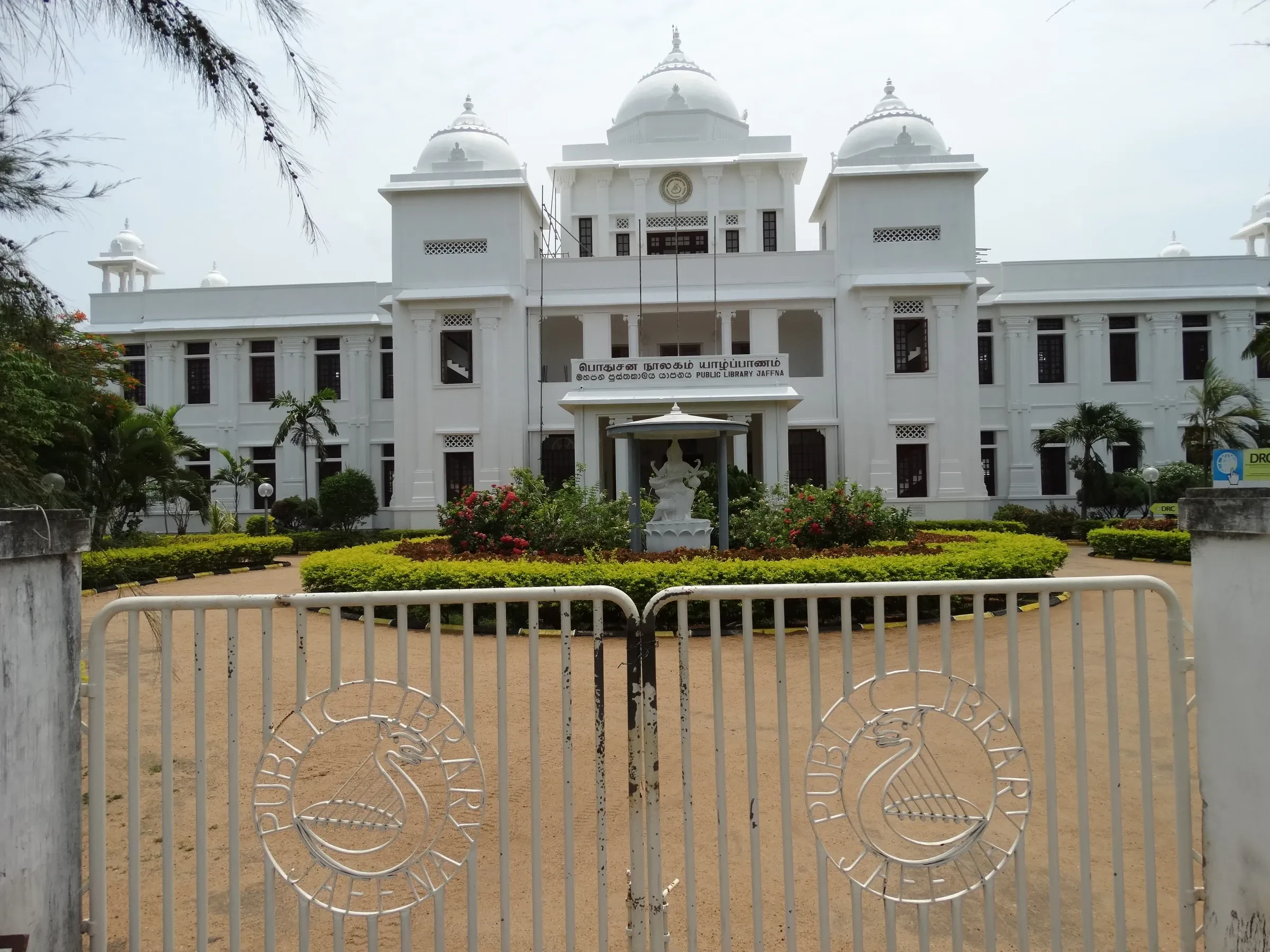 The white domed Jaffna Public Library behind its front gates