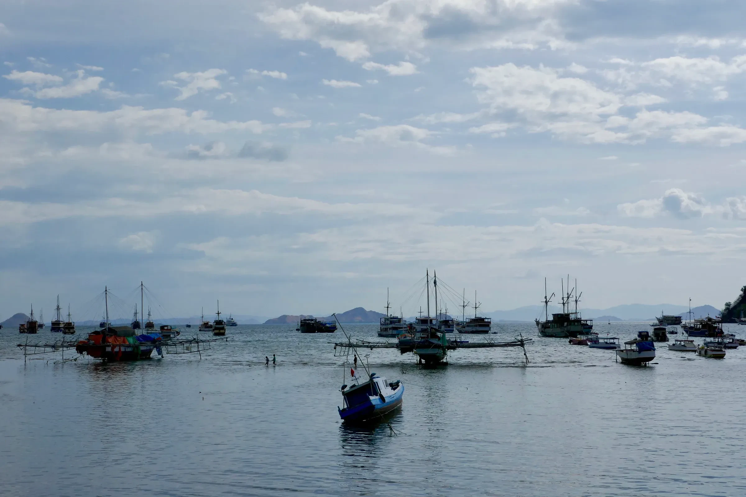 Boats at anchor in Labuan Bajo harbour, where Komodo dive trips start
