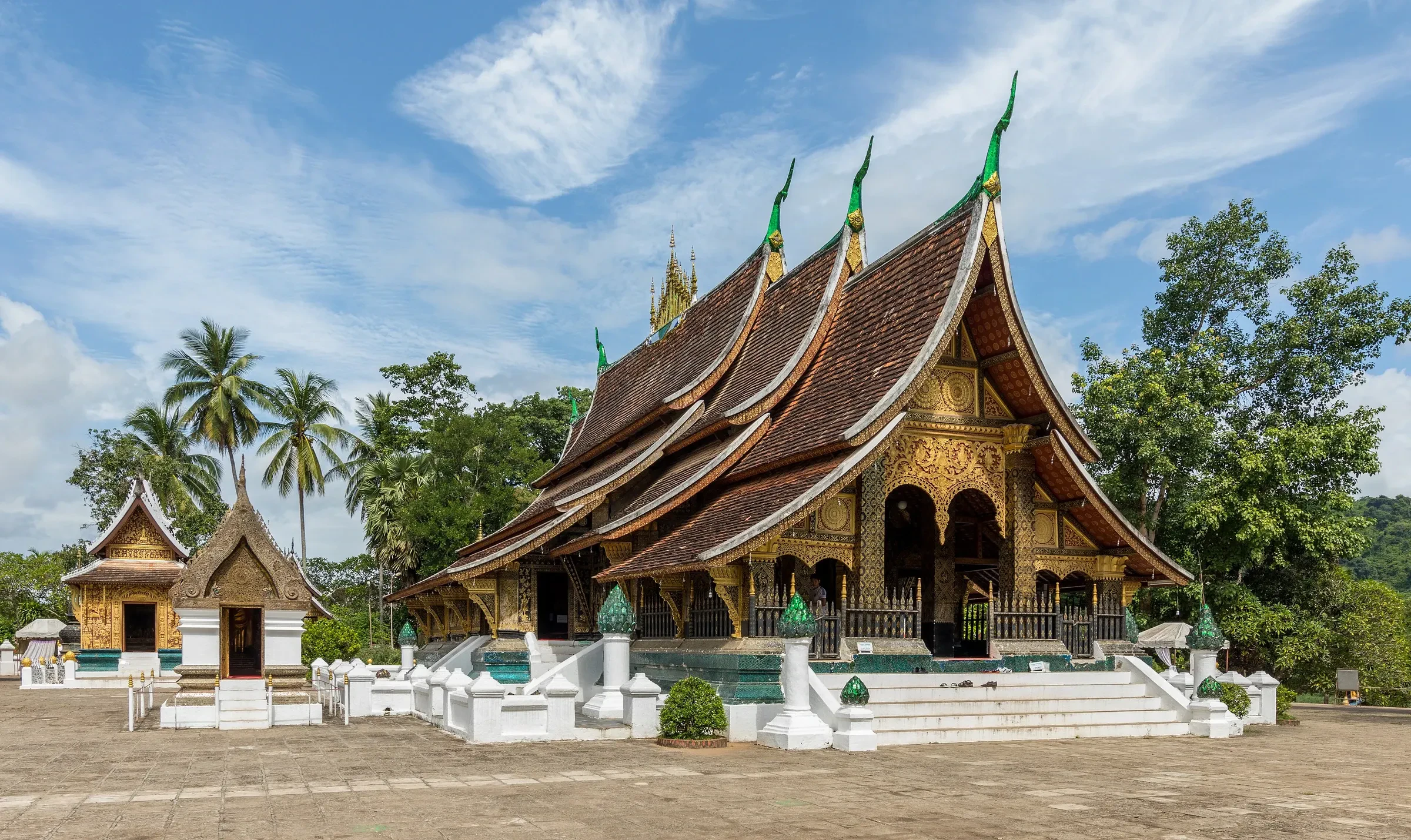 The carved wooden roofs of Wat Xieng Thong temple in Luang Prabang, Laos
