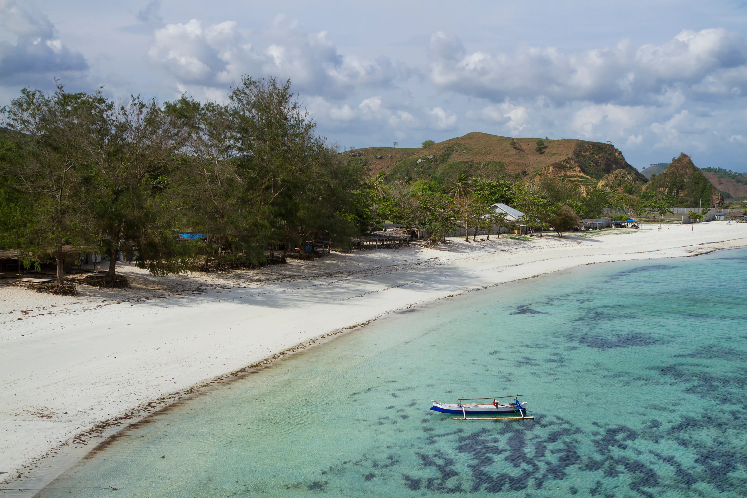 Tanjung Aan beach near Kuta Lombok, a white-sand bay with clear shallow water