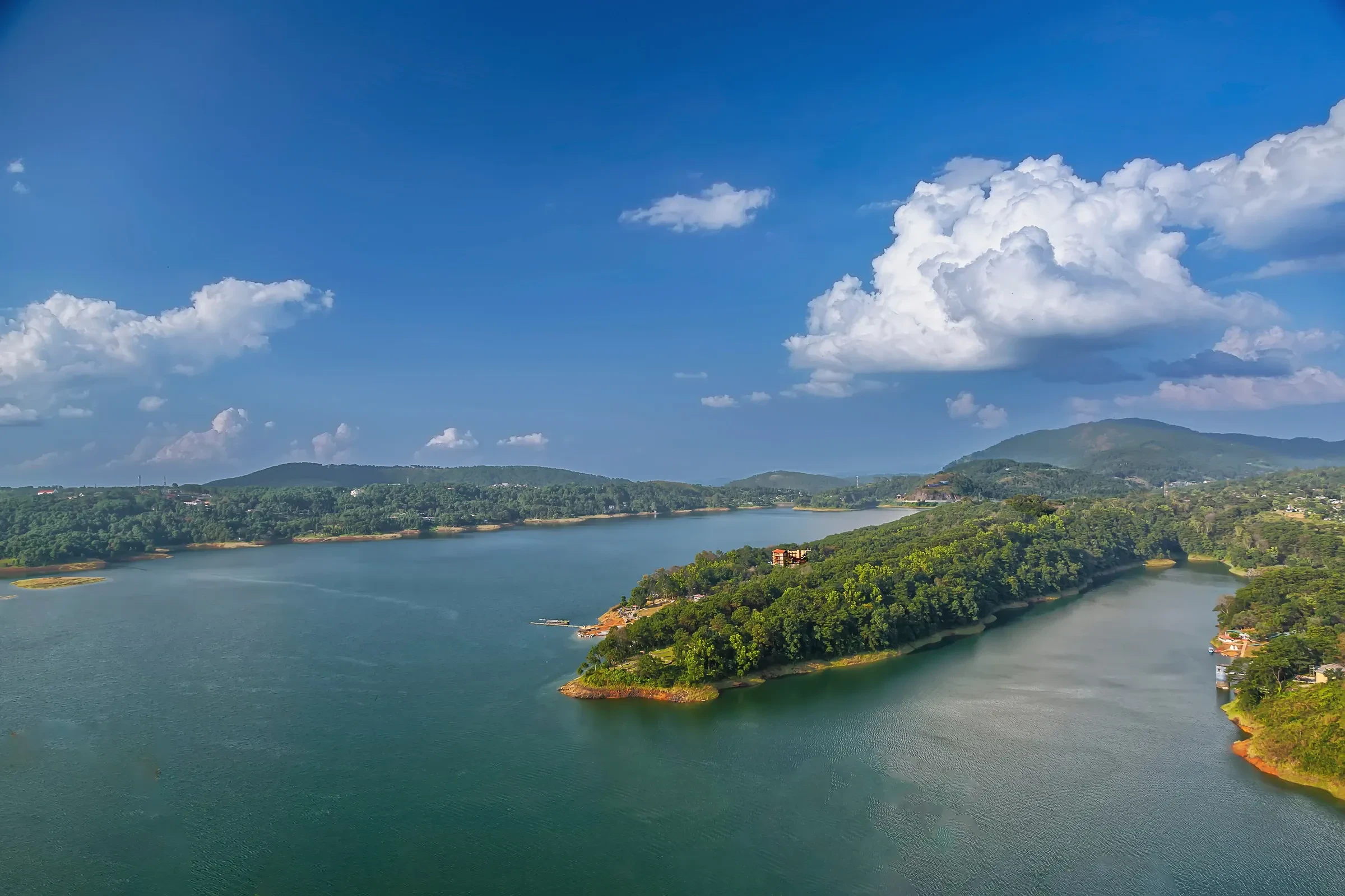Umiam Lake near Shillong seen from above, with forested hills around the water