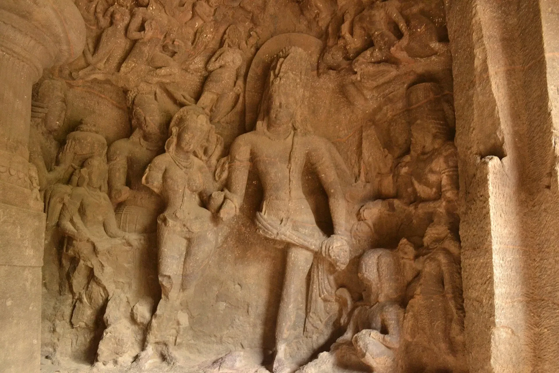 A rock-cut Shiva relief carved into a wall inside the Elephanta Caves on Elephanta Island