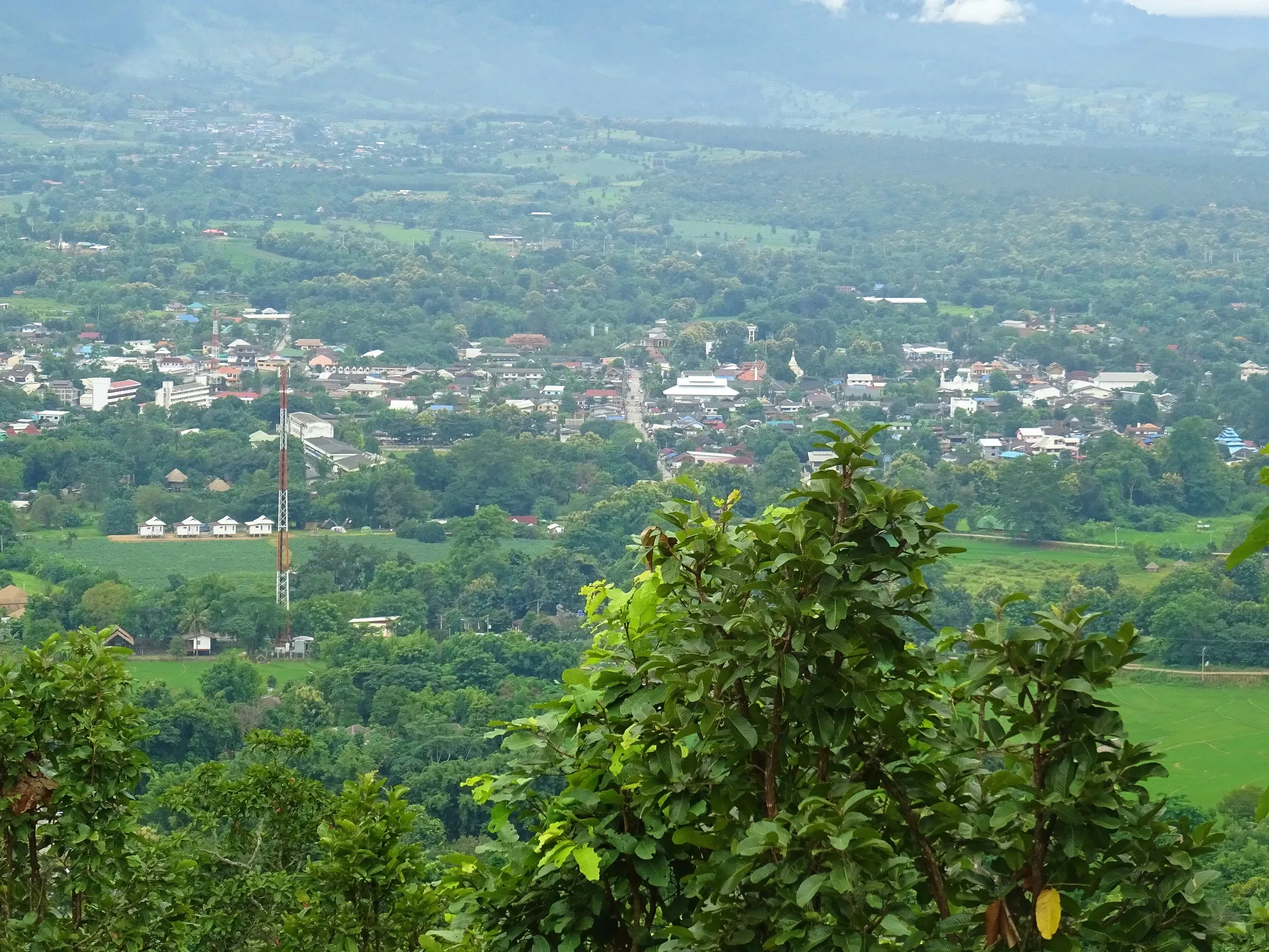 The town of Pai and its green fields seen from the Big Buddha hill