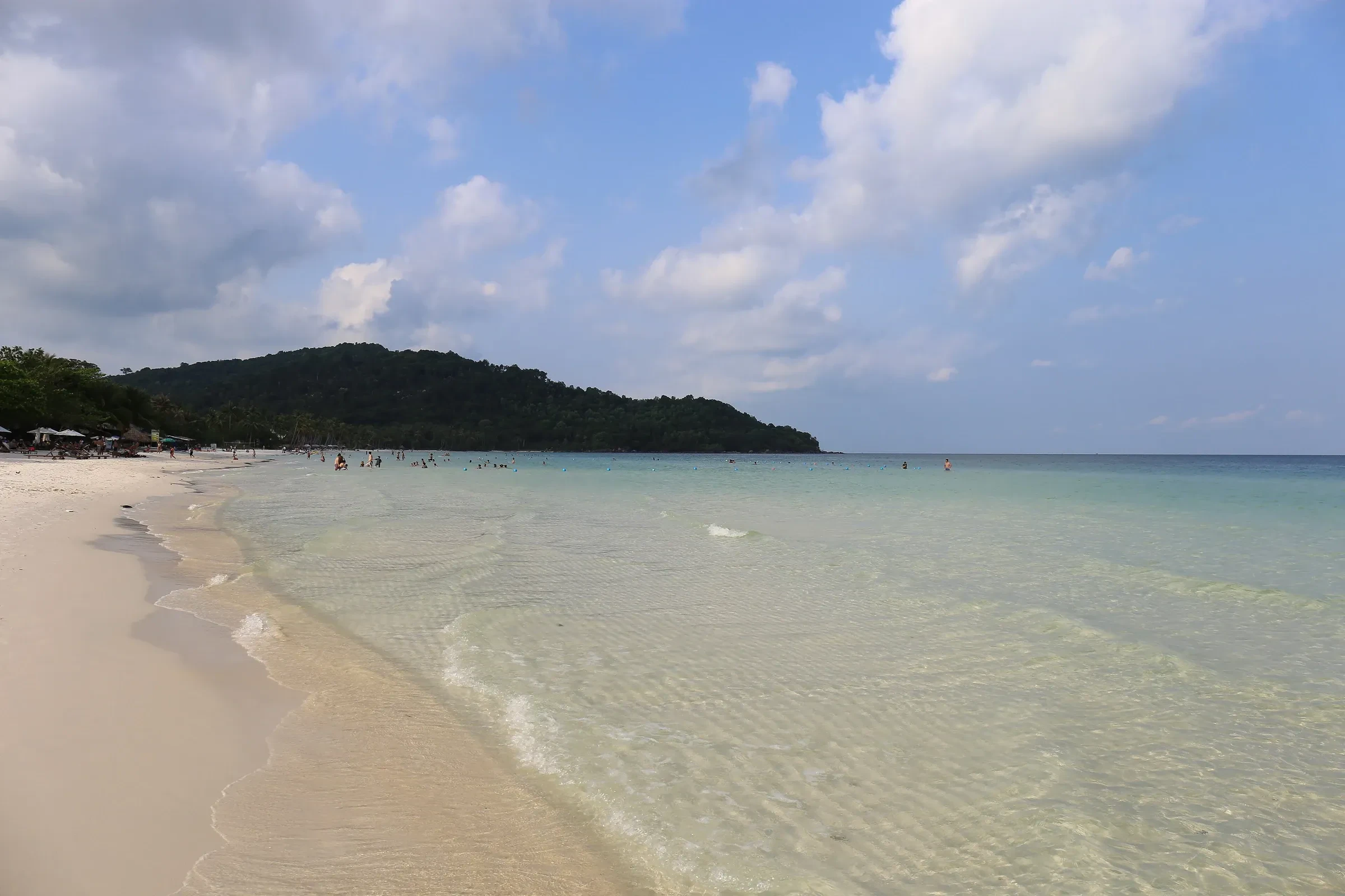 Clear shallow water and pale sand at Sao Beach on Phu Quoc
