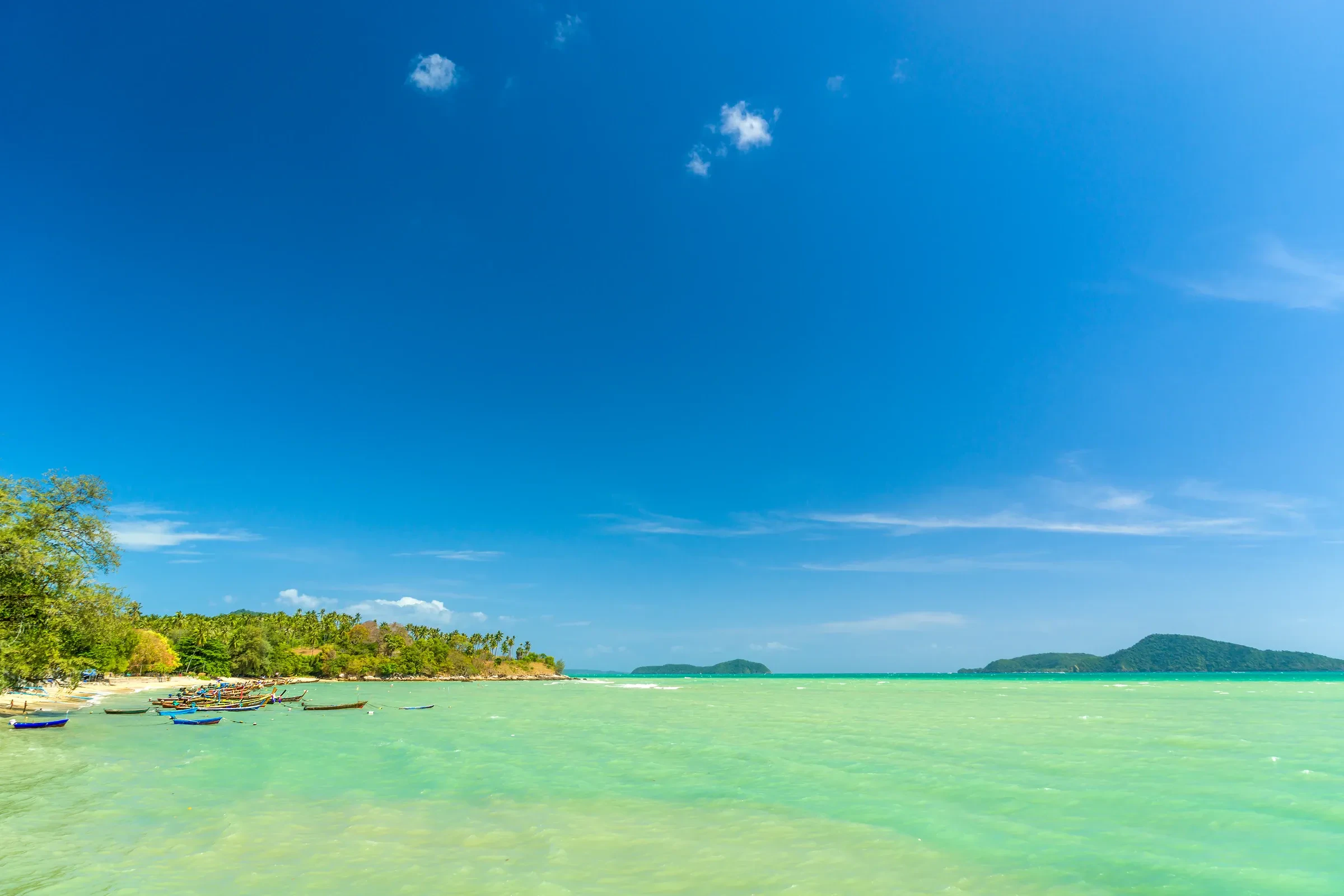 Clear turquoise water and a quiet bay at Nai Harn on Phuket's southern tip