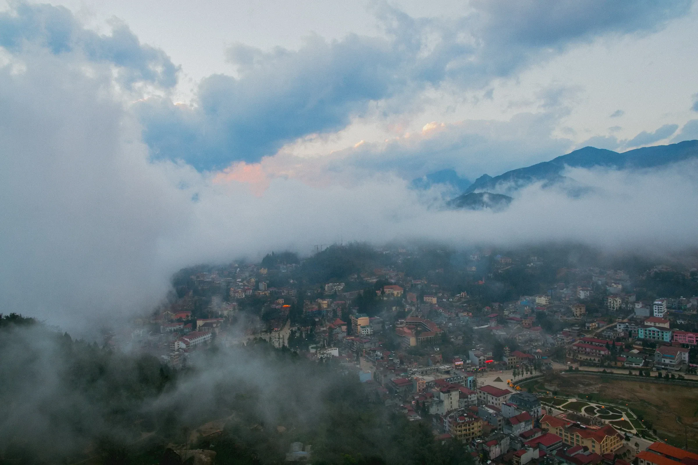 Sa Pa town and its hillsides under low cloud