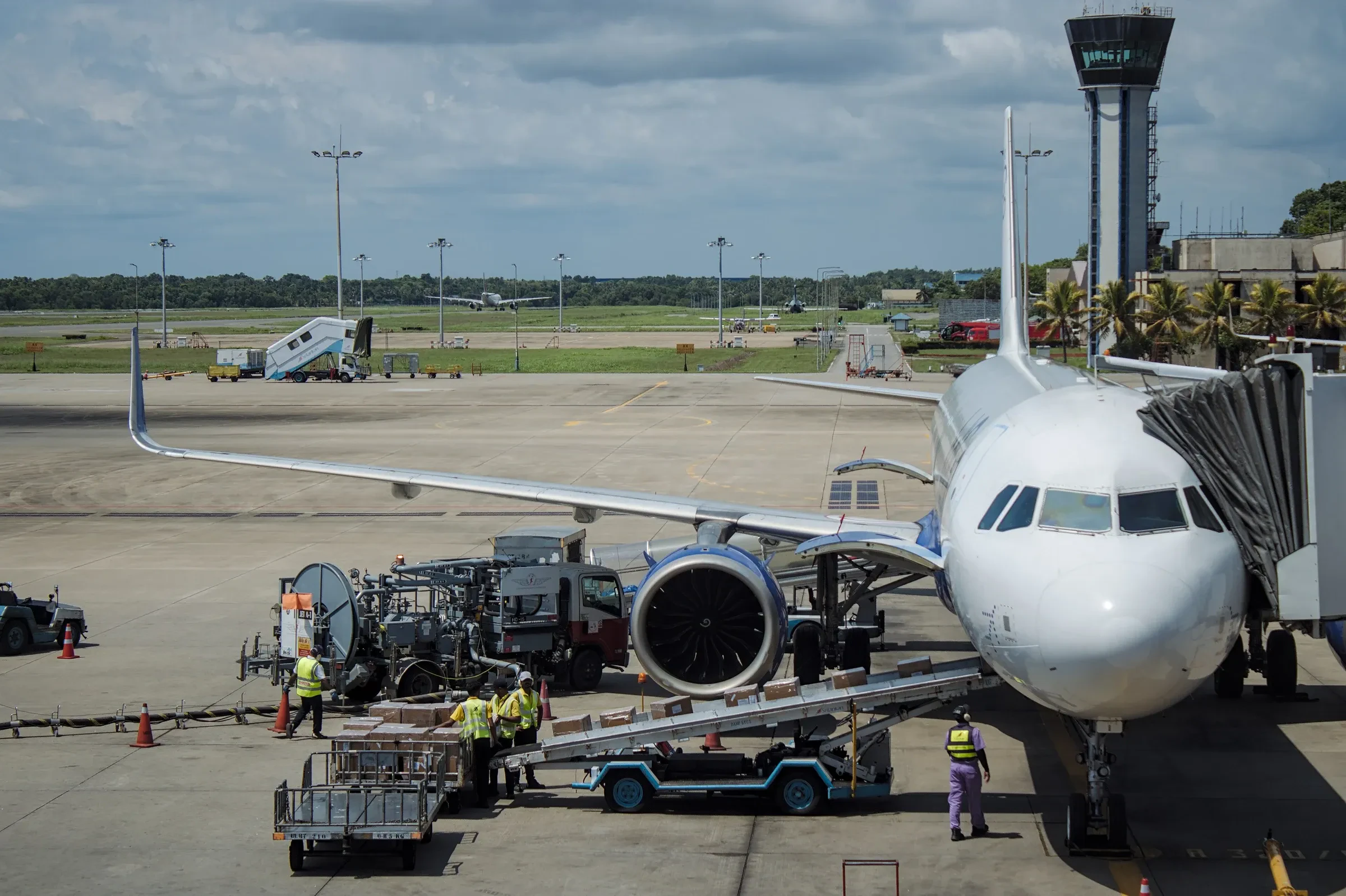 An IndiGo Airbus parked at a gate at Colombo airport