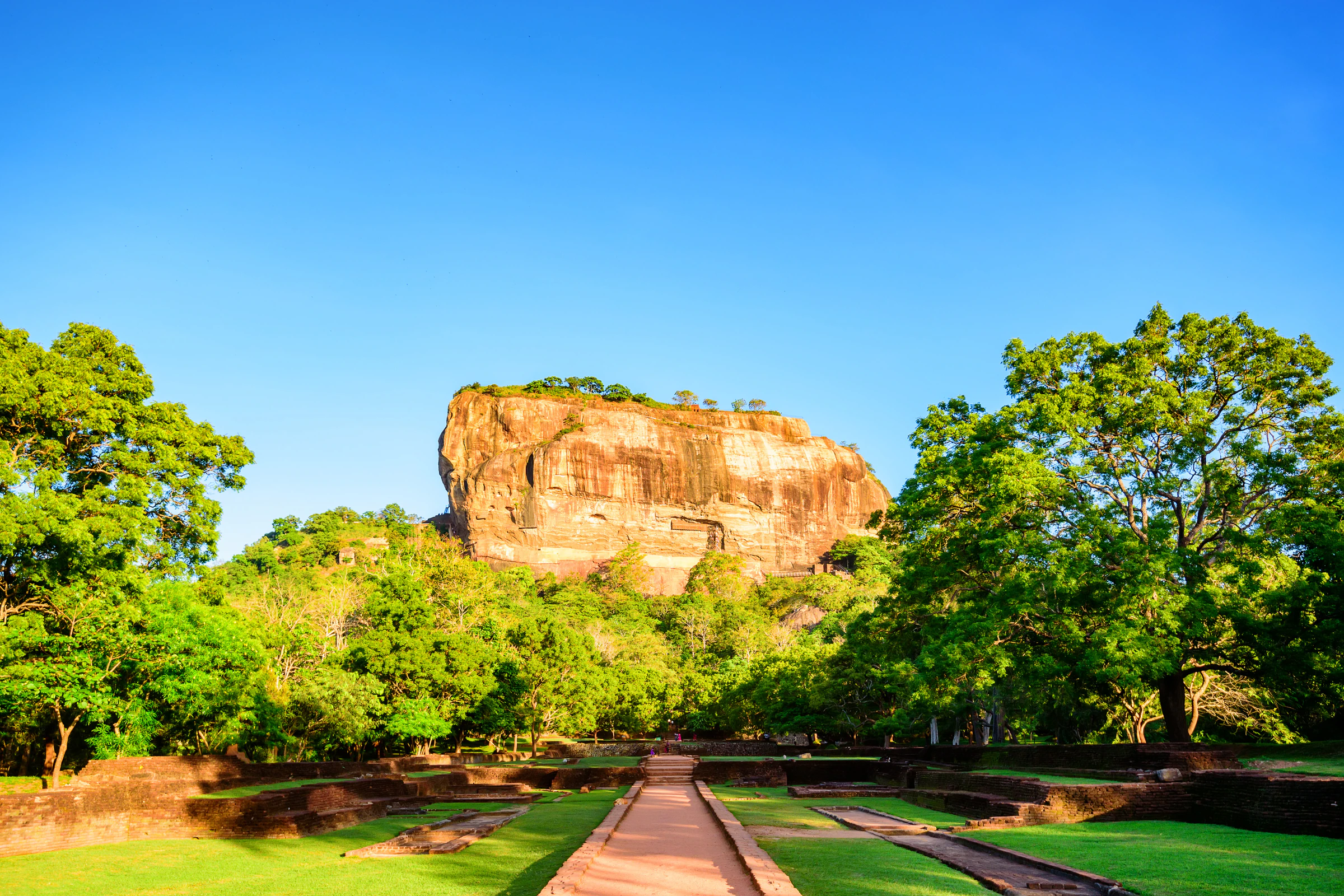 Sigiriya rock fortress rising out of the jungle in Sri Lanka's Cultural Triangle