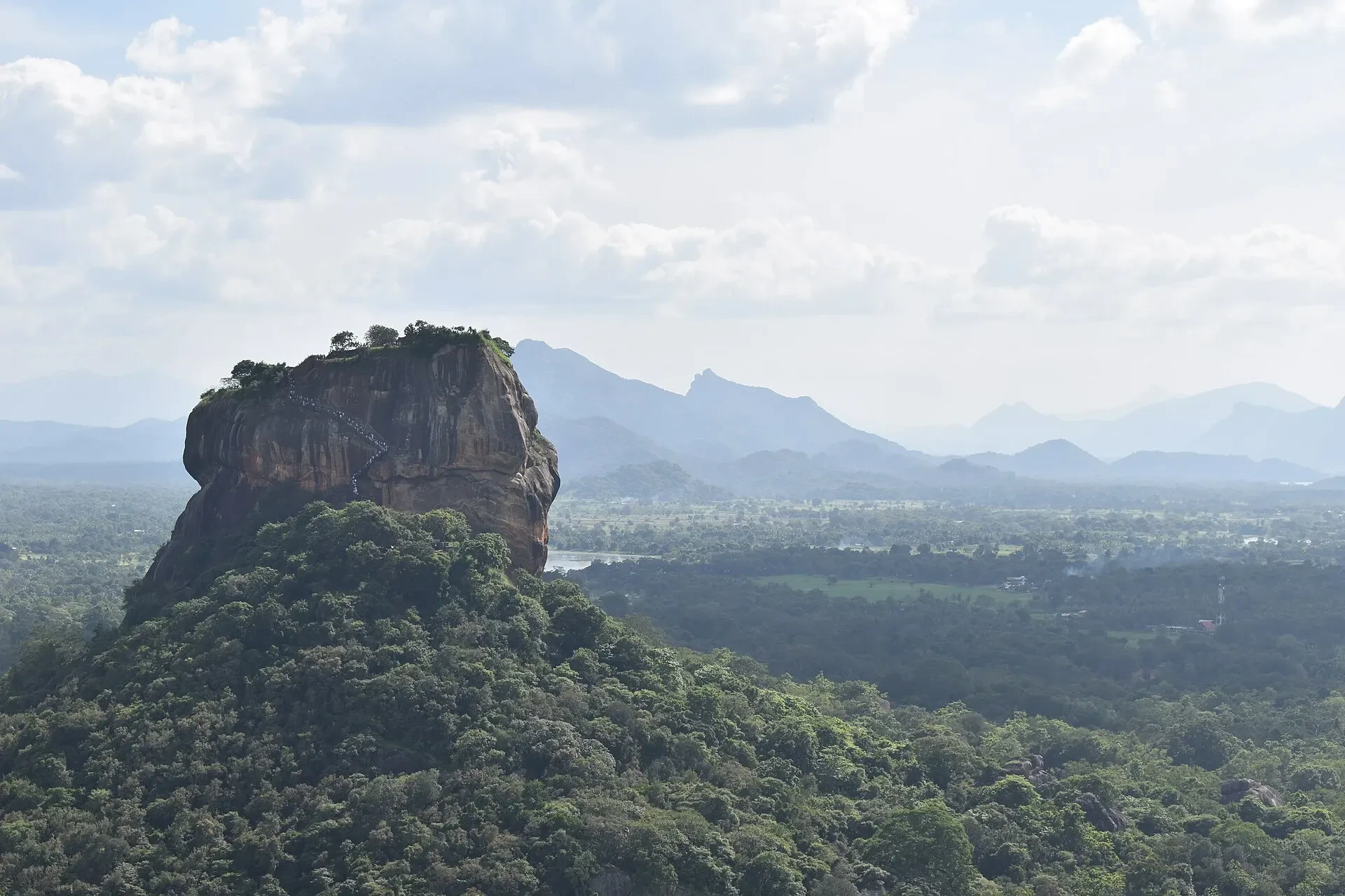Sigiriya rock rising above the forest, seen from Pidurangala rock