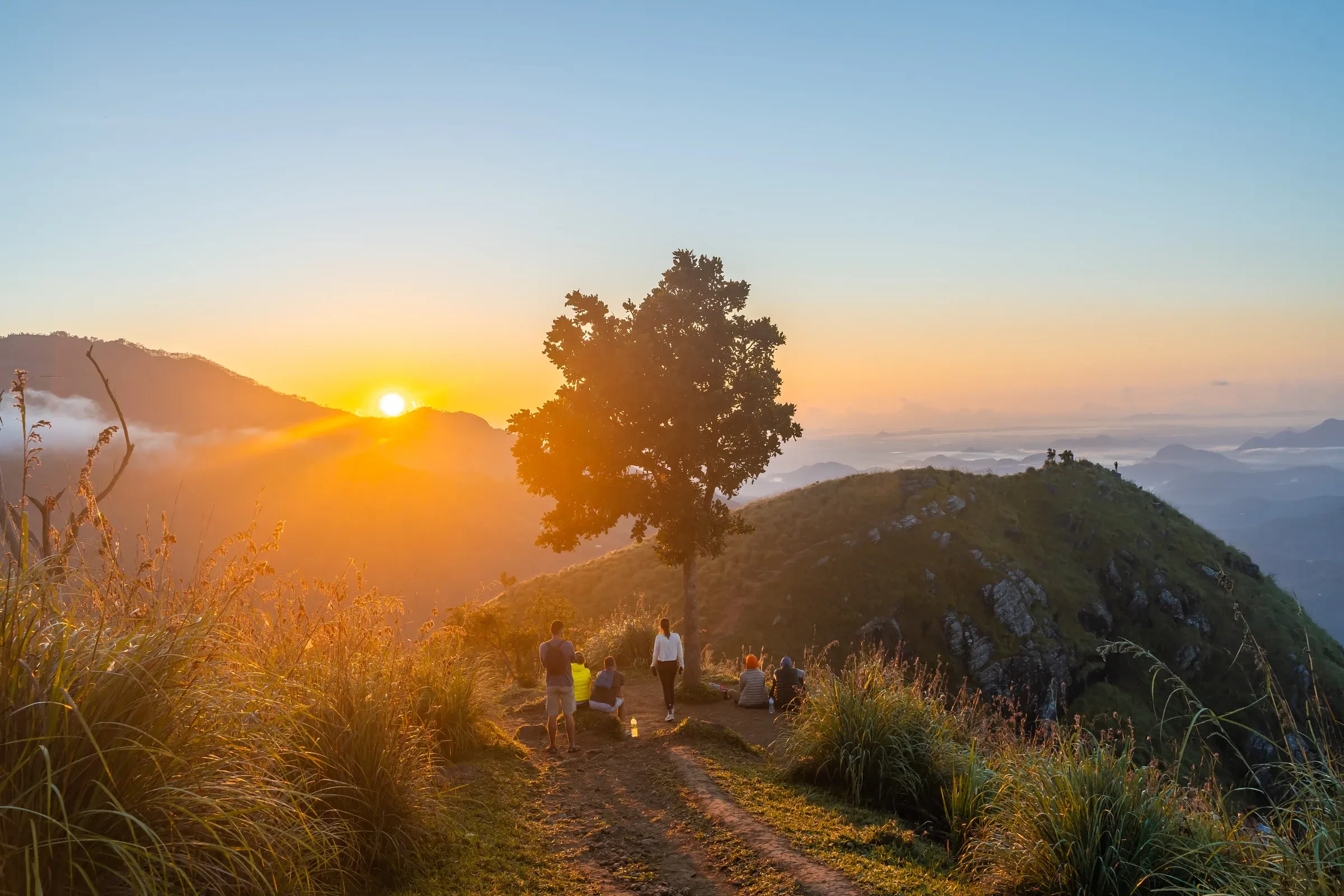 Sunrise over the hills from the Little Adam's Peak trail near Ella, in Sri Lanka's hill country