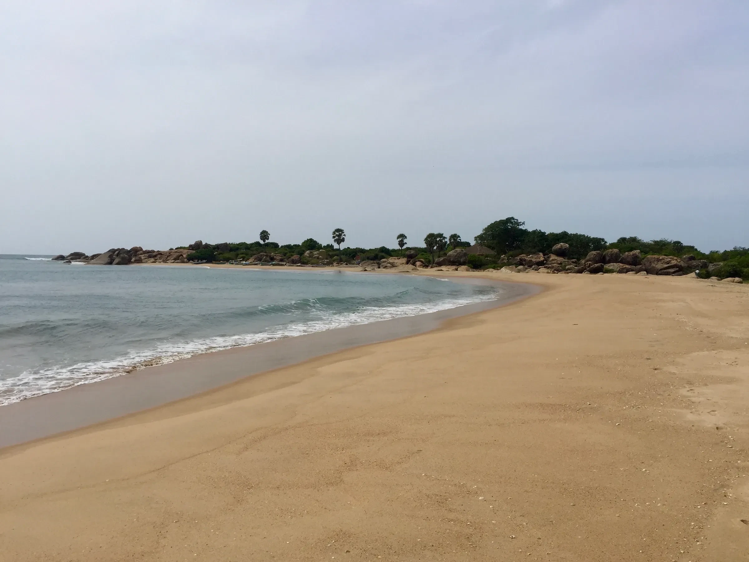 Waves rolling in onto the sand at Whiskey Point, Arugam Bay