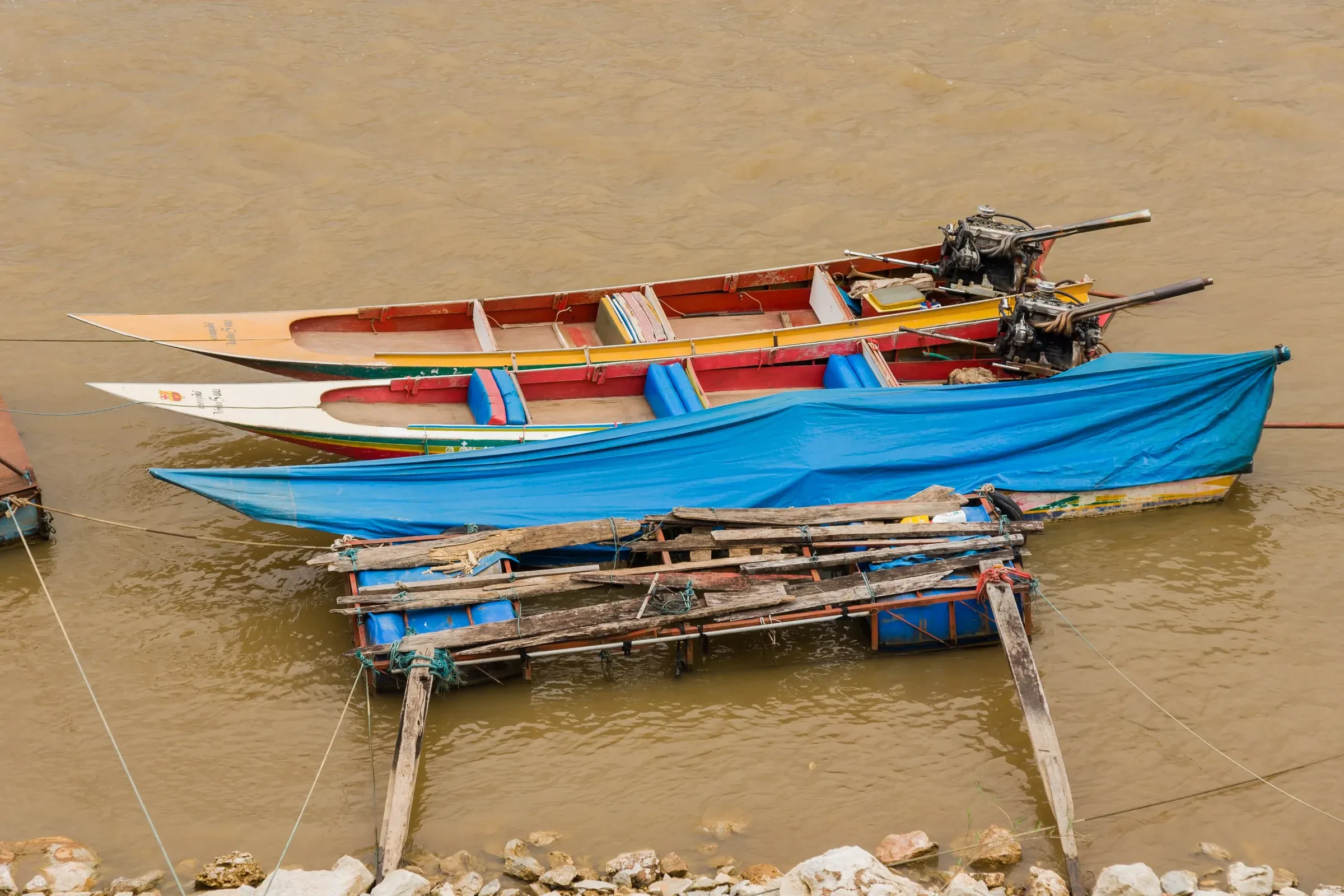Longtail boats moored on the Mekong at Sop Ruak in the Golden Triangle