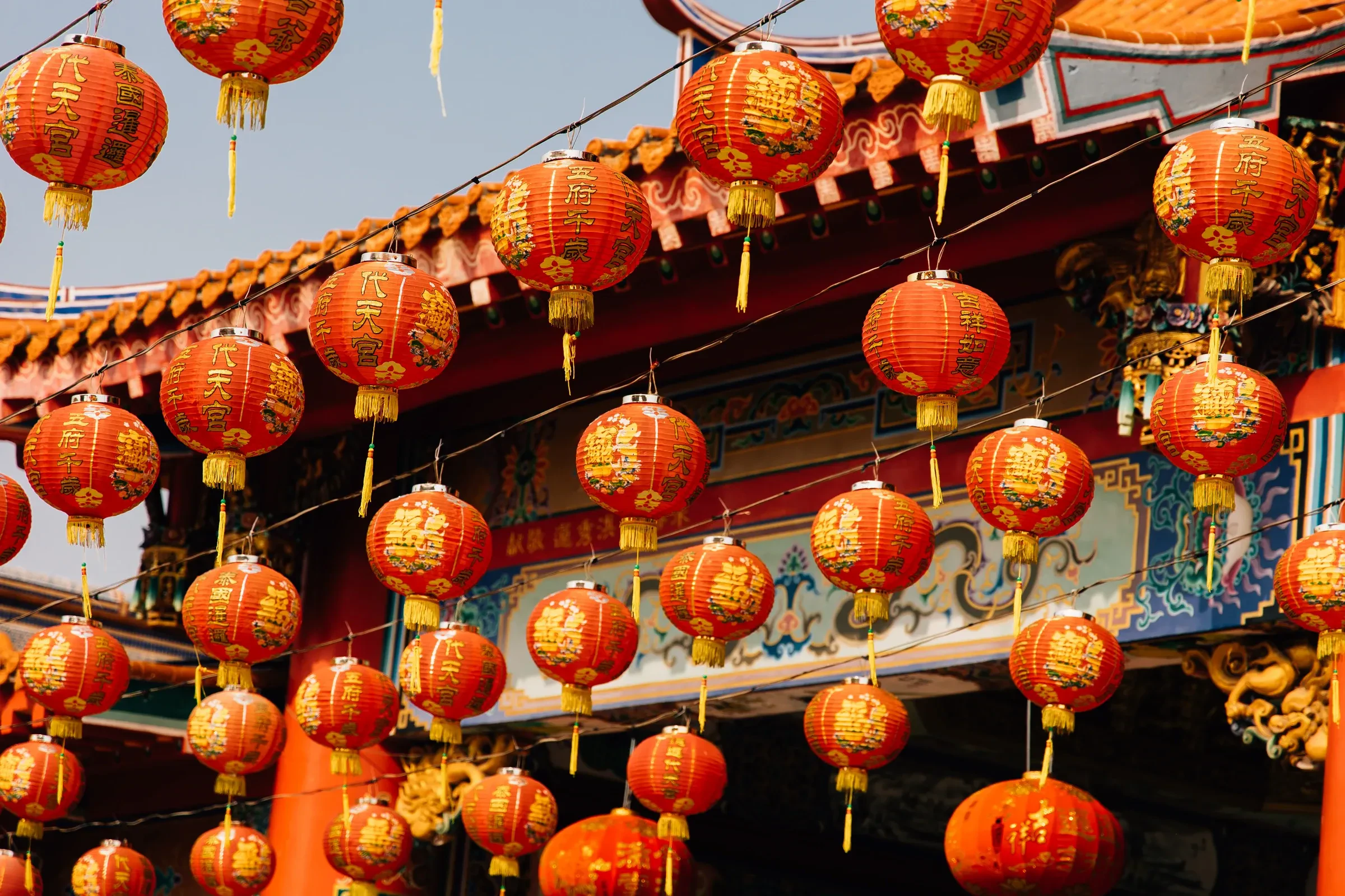 The entrance to a Chinatown district lit up at night