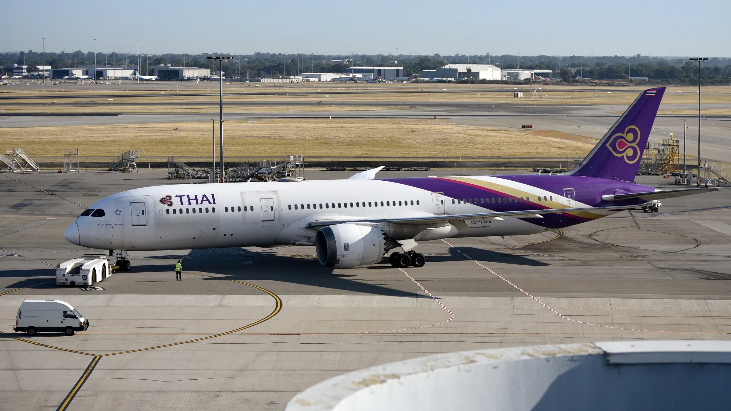 A Thai Airways Boeing 787-9 being pushed back from the terminal at Perth Airport