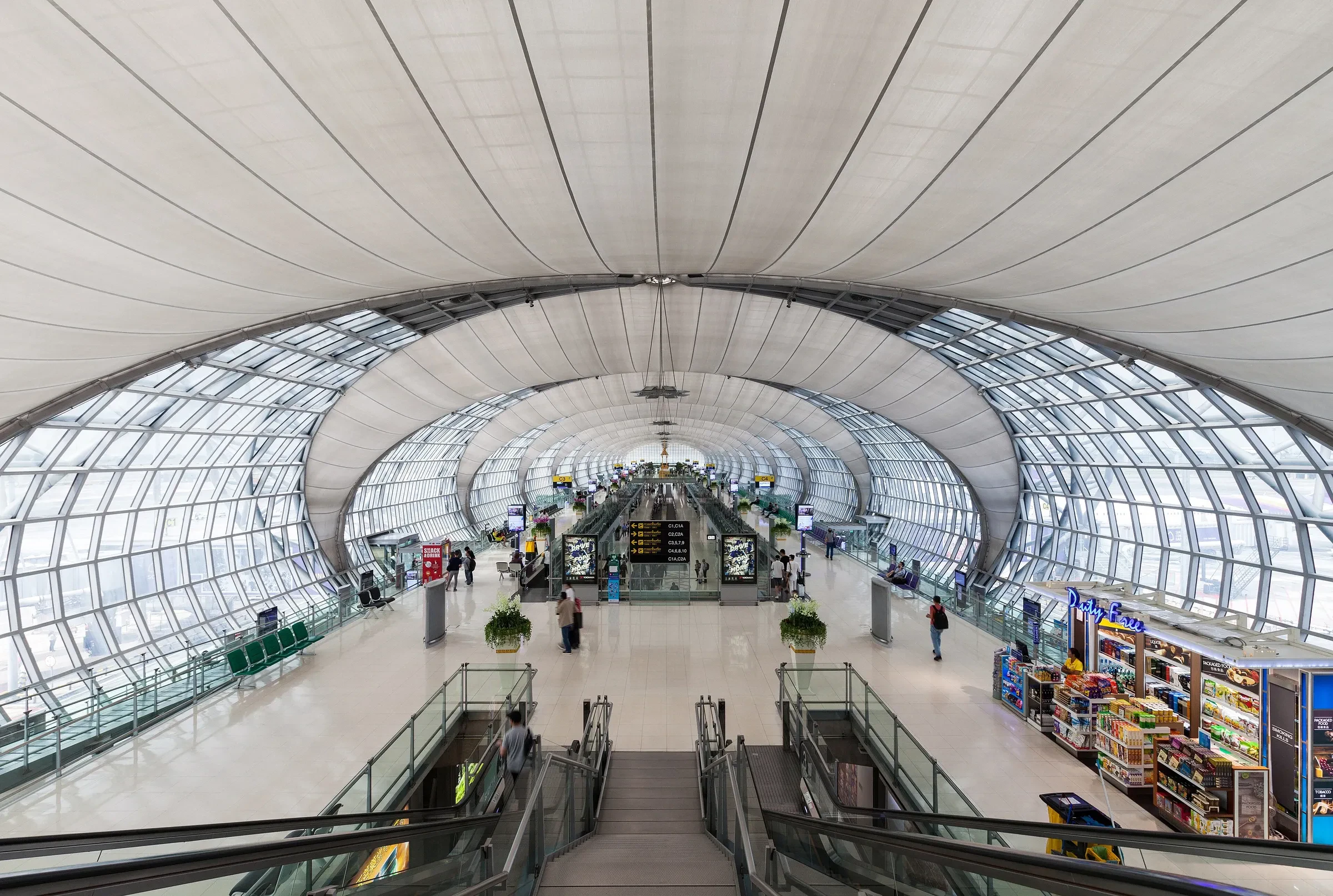 The glass-roofed concourse at Suvarnabhumi Airport in Bangkok