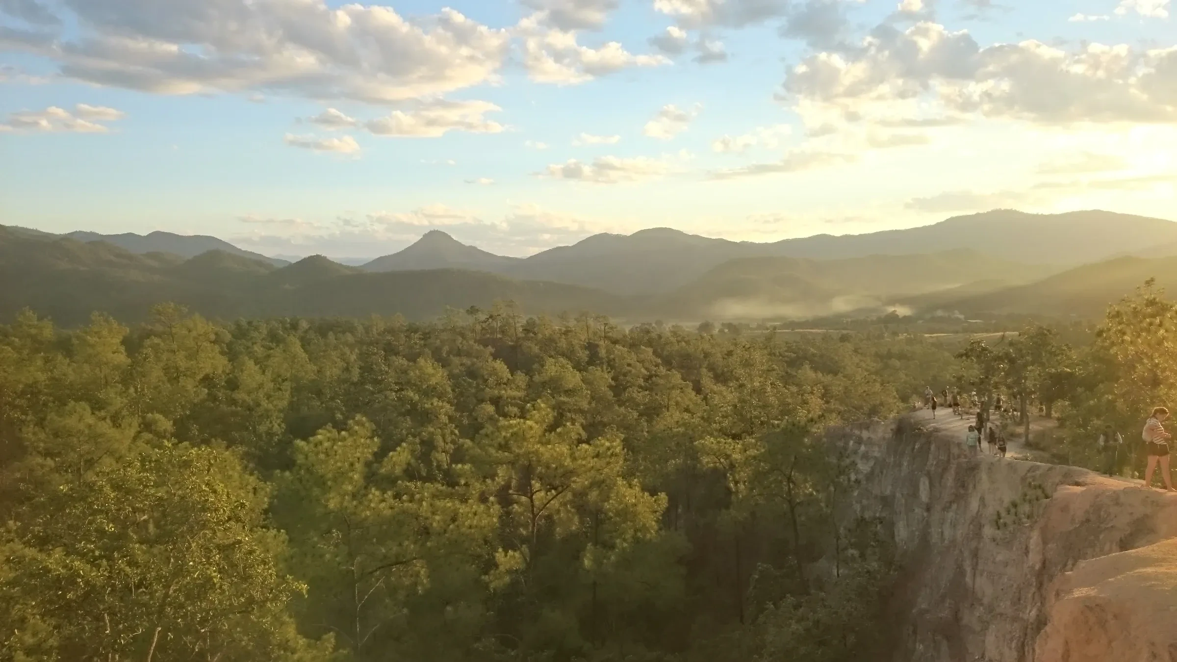 Pai Canyon's clay ridge above forested hills at sunset near Pai in northern Thailand