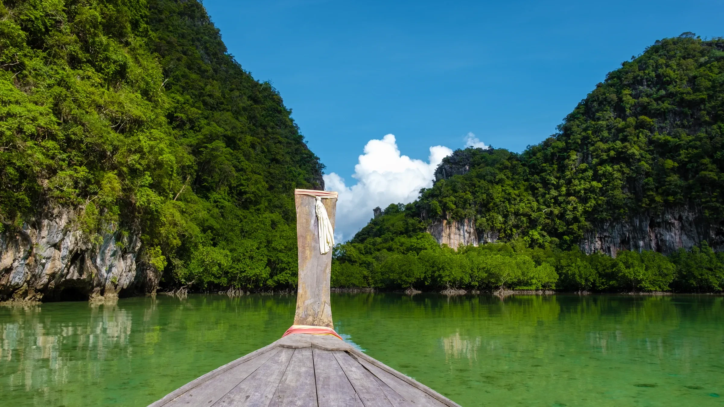 Limestone islands seen from a longtail boat near Koh Hong, Krabi